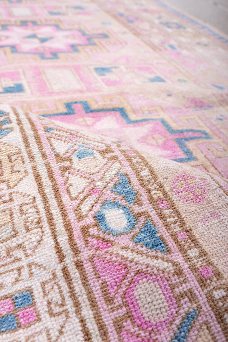 3' x 9' one-of-a-kind handmade antique Sarab runner rug. Color palette: ivory, blush, sky blue, camel, taupe, rose, pink