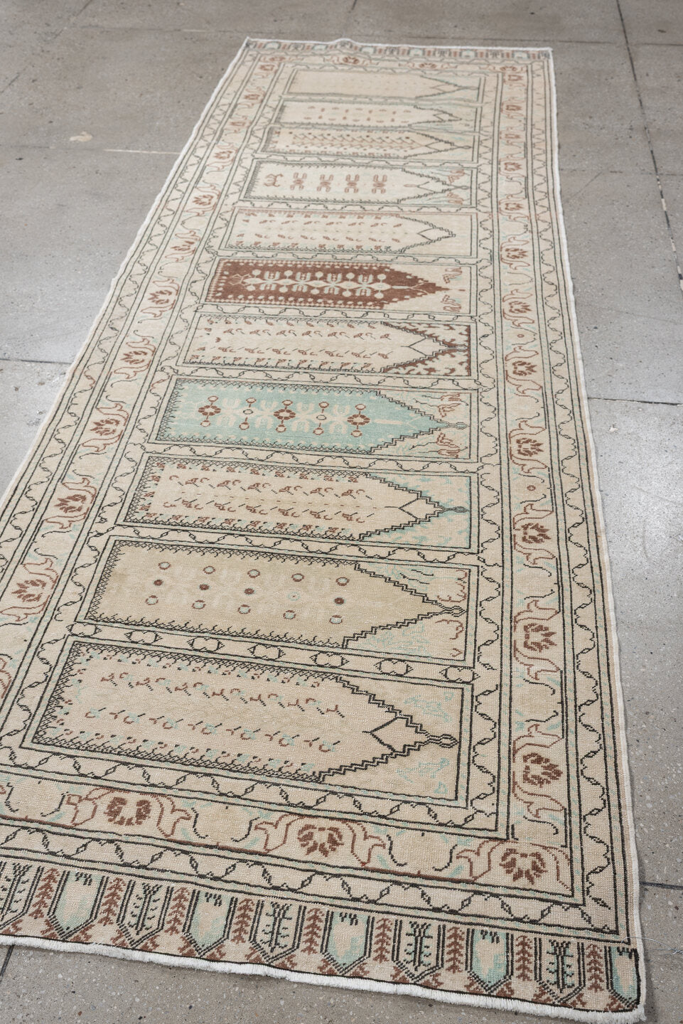 3' x 9' one-of-a-kind handmade antique Kaisary runner rug. Color palette: ivory, taupe, pale aqua, terracotta, camel