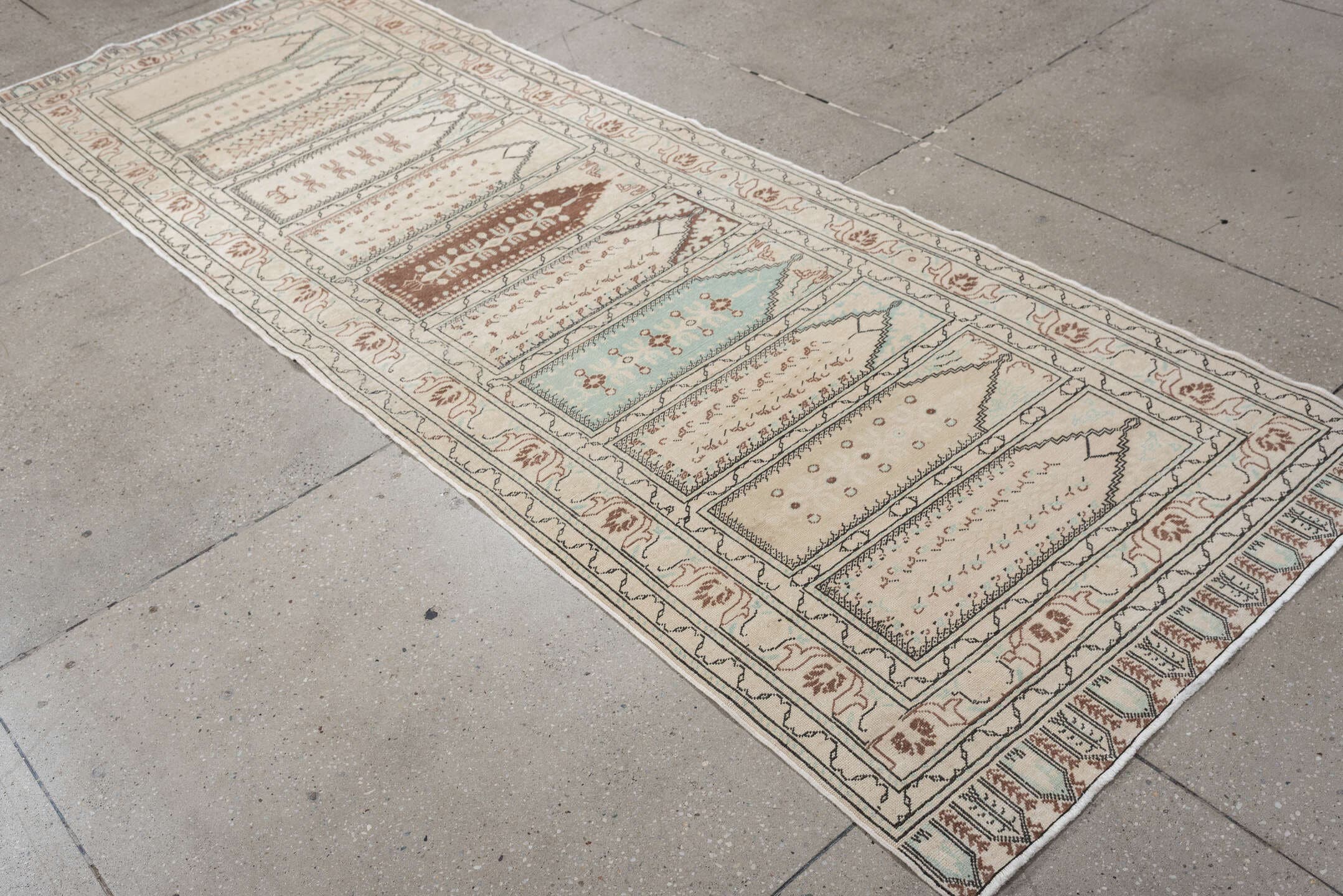 3' x 9' one-of-a-kind handmade antique Kaisary runner rug. Color palette: ivory, taupe, pale aqua, terracotta, camel