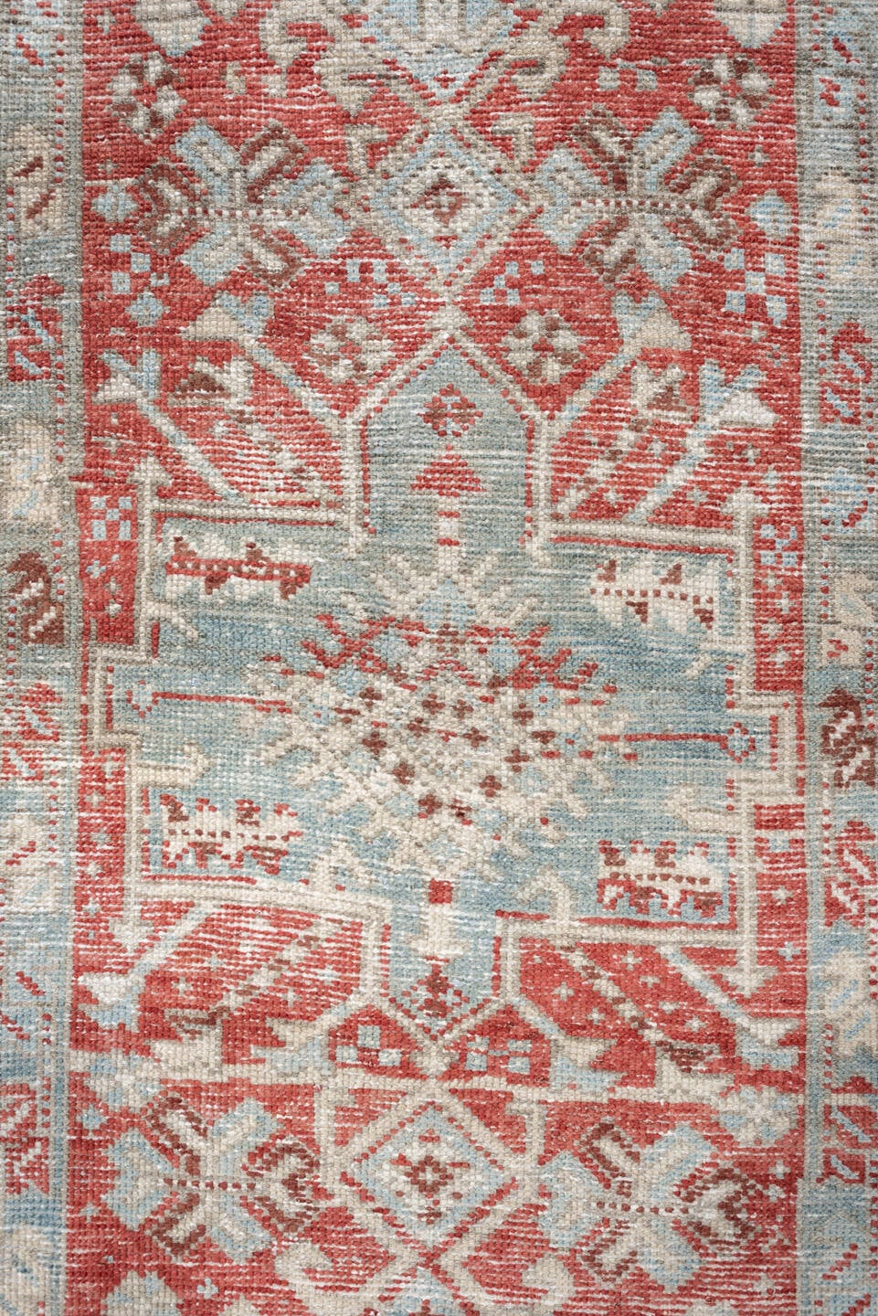 3' x 10' one-of-a-kind handmade vintage Heriz runner rug. Color palette: pale blue, terracotta, ivory, brick red, taupe