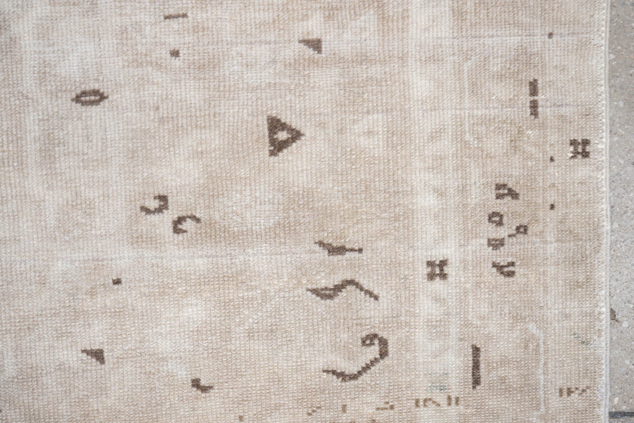 6' x 3' one-of-a-kind handmade vintage Karaje rug. Color palette: ivory, taupe, beige, camel, brown, gray