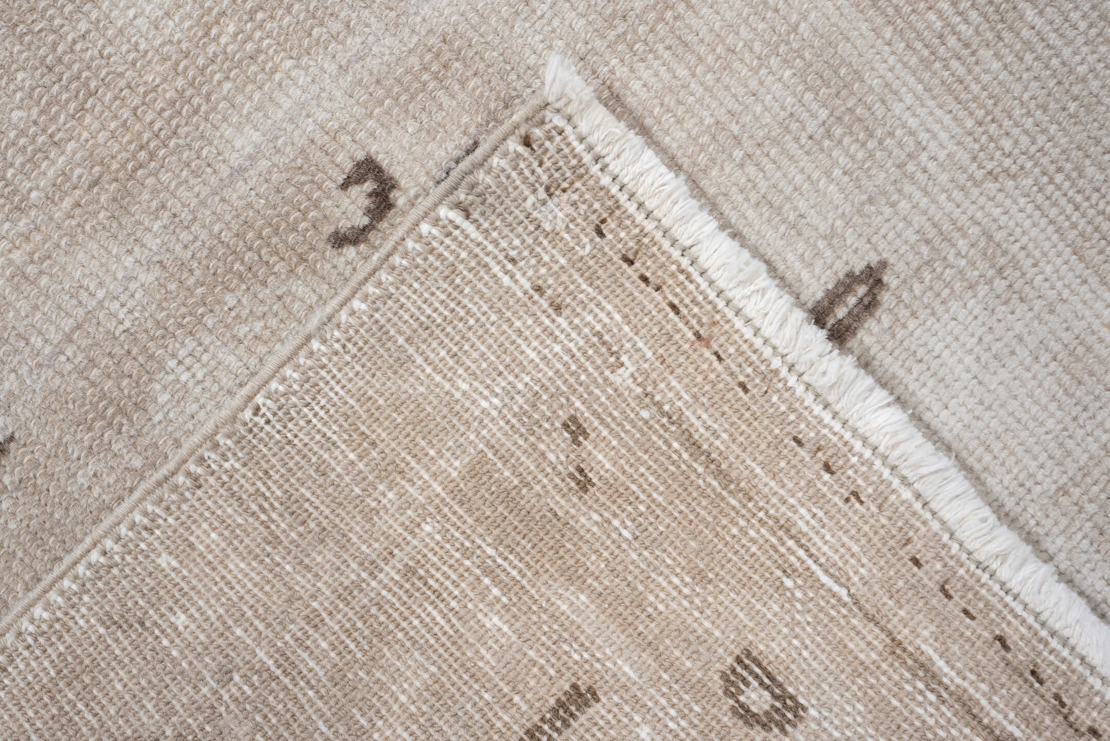 6' x 3' one-of-a-kind handmade vintage Karaje rug. Color palette: ivory, taupe, beige, camel, brown, gray
