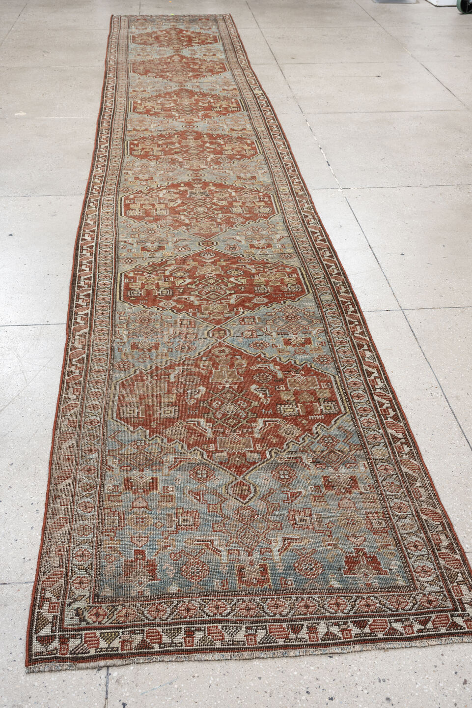 3' x 17' one-of-a-kind handmade vintage runner rug. Color palette: light blue, terracotta, ivory, taupe, camel, brown, beige