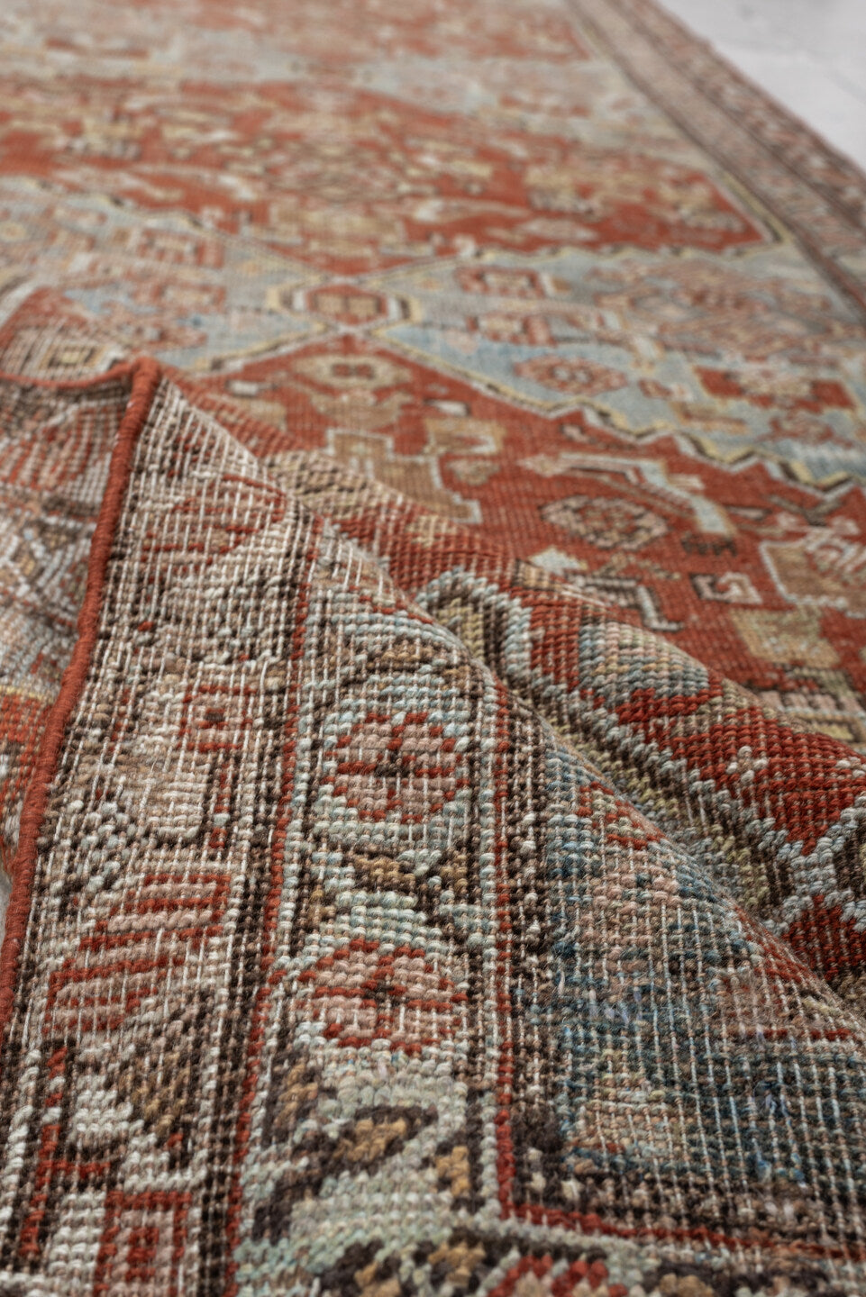 3' x 17' one-of-a-kind handmade vintage runner rug. Color palette: light blue, terracotta, ivory, taupe, camel, brown, beige