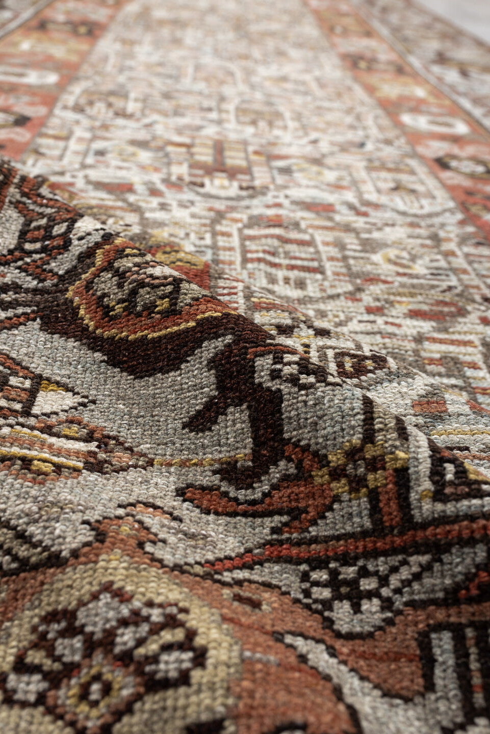 3' x 12' one-of-a-kind handmade antique Malayer runner rug. Color palette: ivory, rust, camel, taupe, brown, rose, charcoal