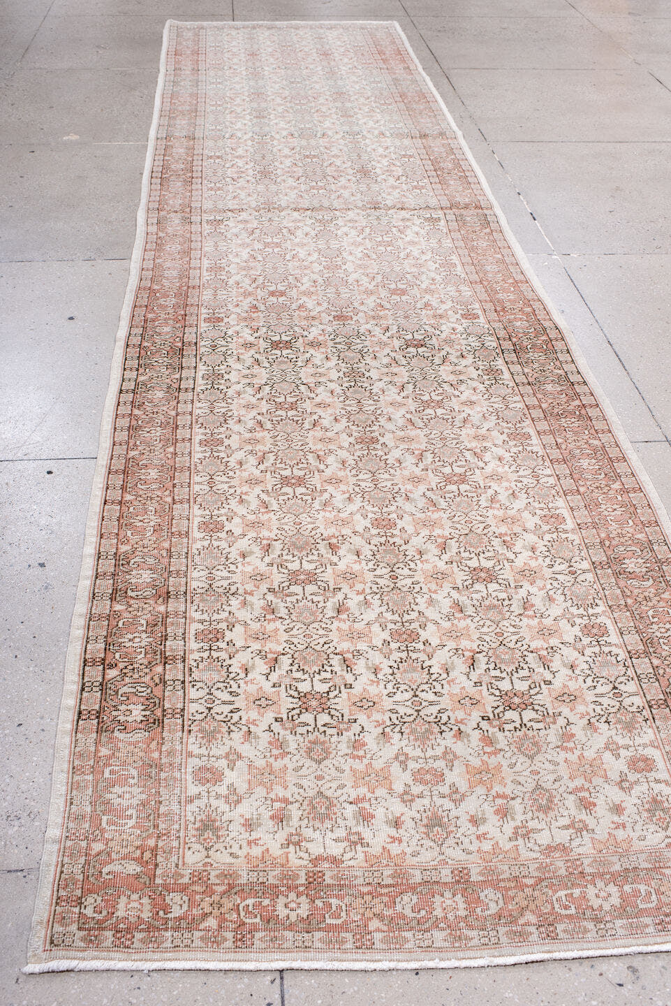 3' x 15' one-of-a-kind handmade antique Sparta runner rug. Color palette: ivory, blush, rose, taupe, sage, camel, pink, red