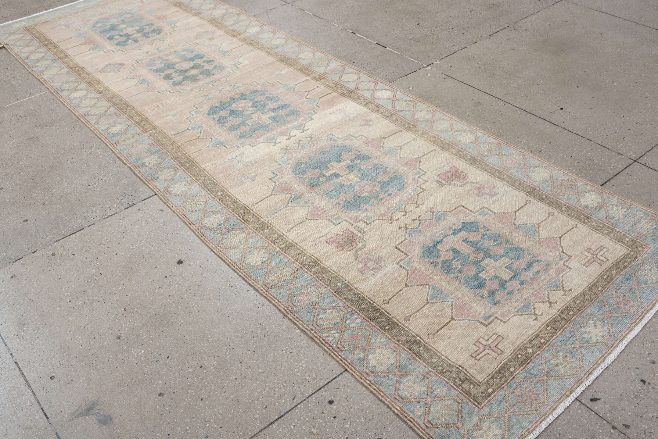 3' x 10' one-of-a-kind handmade antique Saraband runner rug. Color palette: ivory, sky blue, blush, taupe, sage, rose