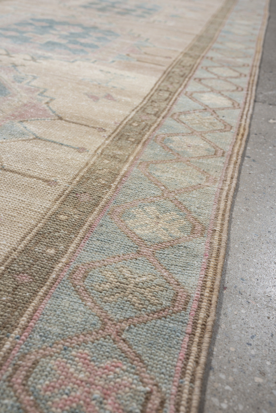 3' x 10' one-of-a-kind handmade antique Saraband runner rug. Color palette: ivory, sky blue, blush, taupe, sage, rose