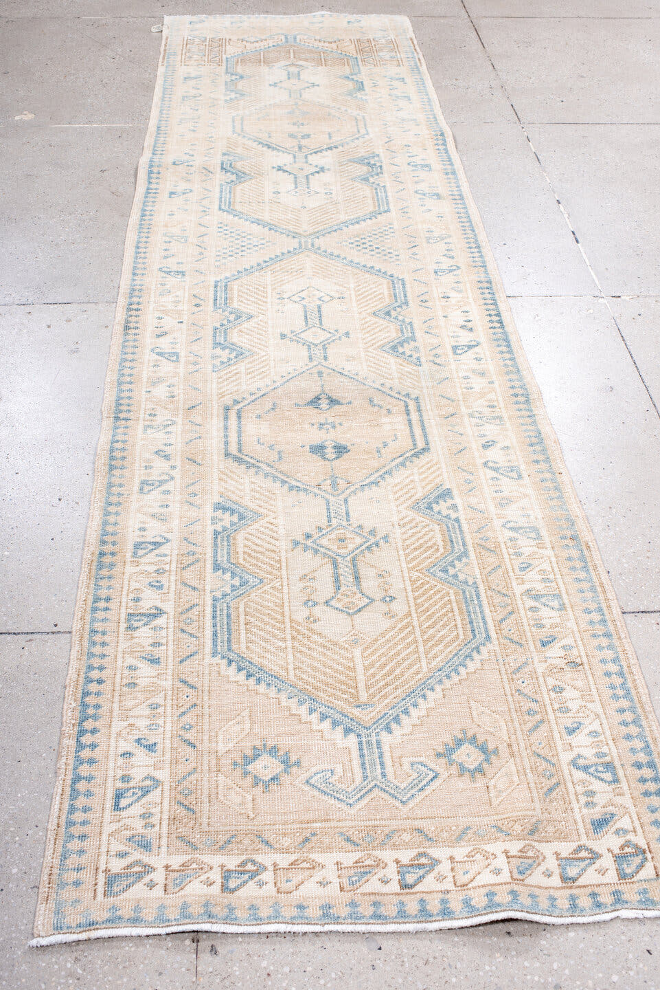 3' x 11' one-of-a-kind handmade antique Sarab runner rug. Color palette: ivory, sky blue, camel, beige, taupe, light blue