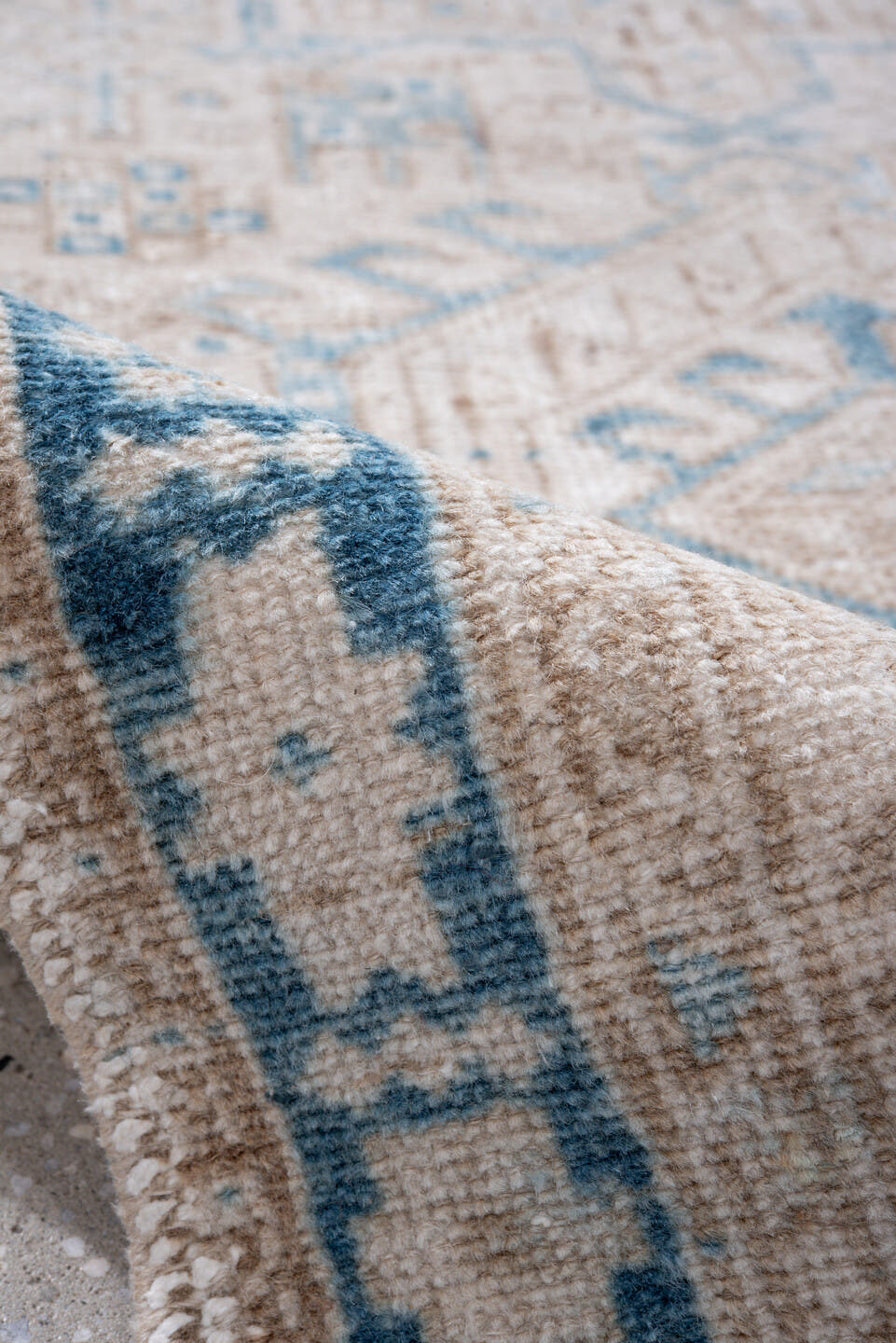 2' x 10' one-of-a-kind handmade vintage Karaje runner rug. Color palette: ivory, sky_blue, beige, taupe, camel, light blue