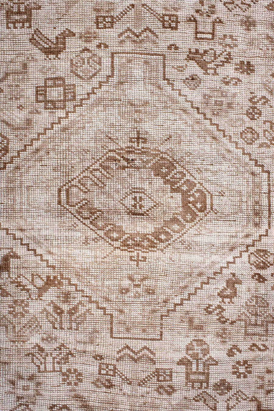 6' x 9' one-of-a-kind handmade antique Shiraz medium size rug. Color palette: ivory, taupe, camel, sand, light brown, beige