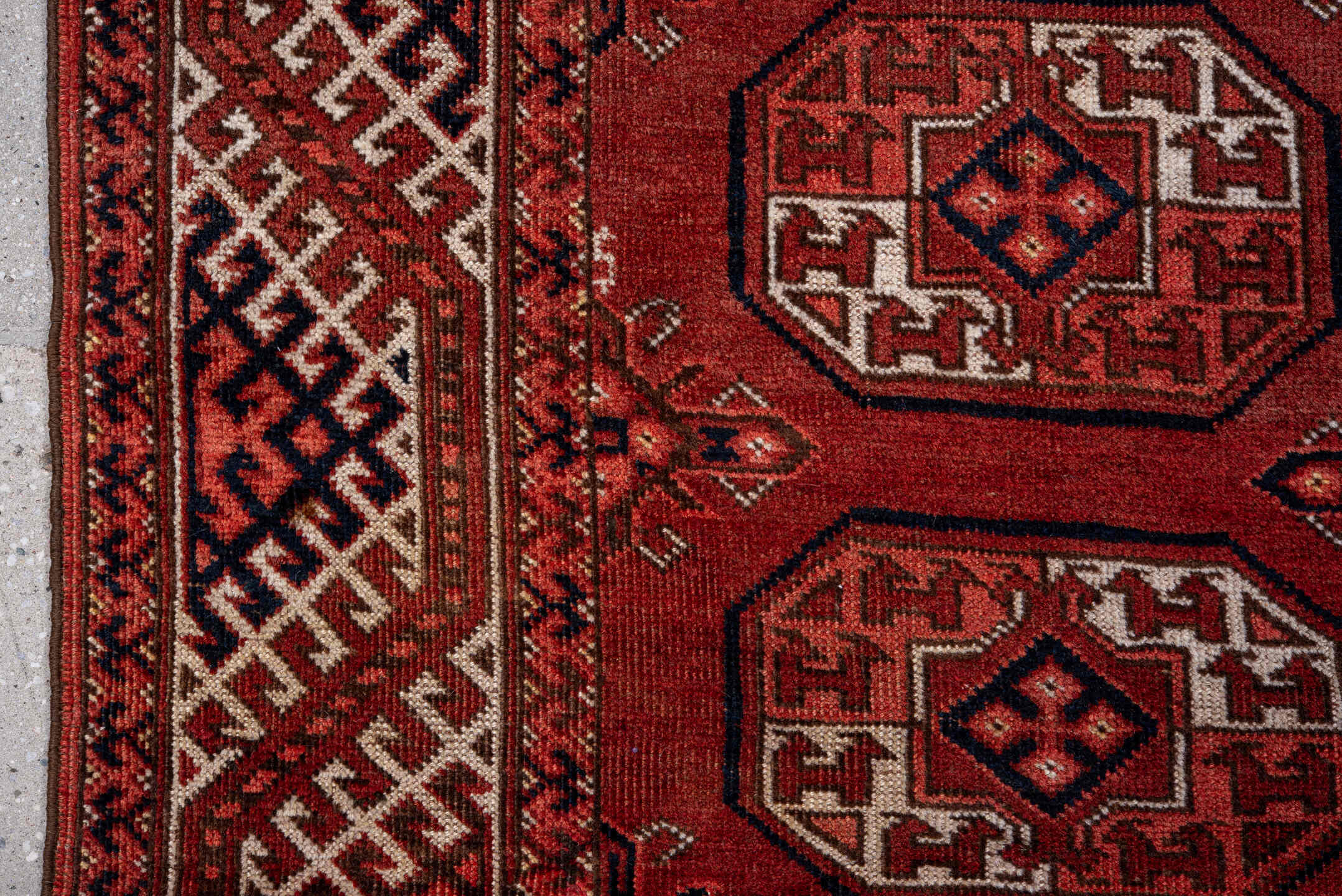 6' x 10' one-of-a-kind handmade vintage Yamoud large size rug. Color palette: black, brown, gray, light gray, pink, red