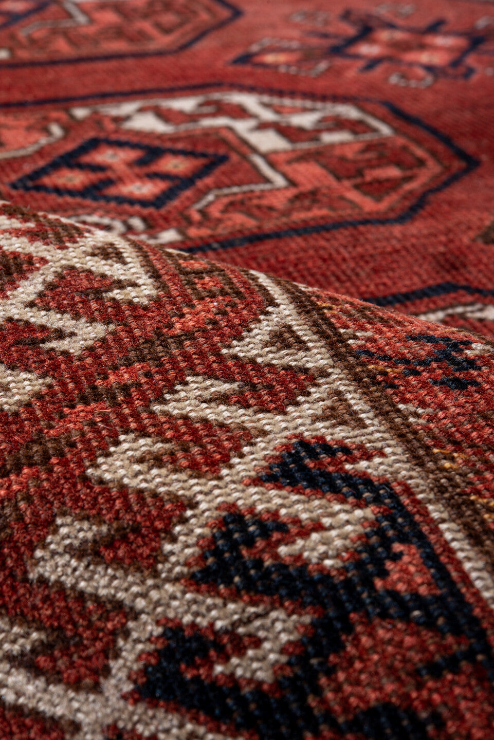 6' x 10' one-of-a-kind handmade vintage Yamoud large size rug. Color palette: black, brown, gray, light gray, pink, red