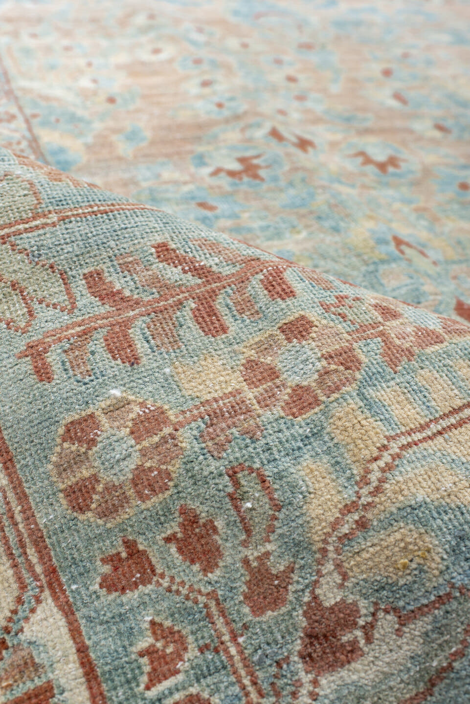 8' x 12' one-of-a-kind handmade vintage Sarouk large size rug. Color palette: pale blue, blush, ivory, terra cotta, cream