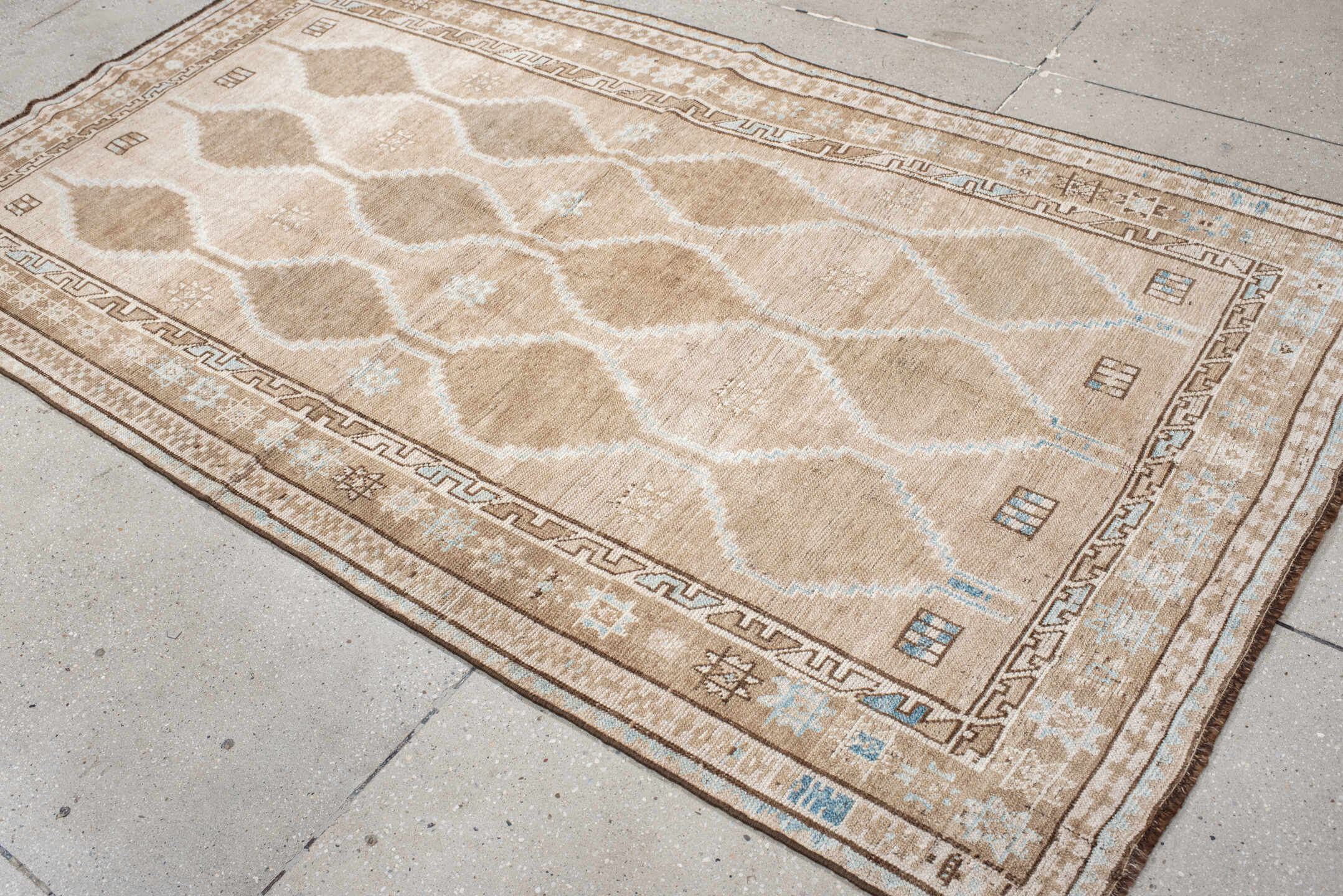 4' x 7' one-of-a-kind handmade antique Gabbe rug. Color palette: beige, taupe, ivory, camel, light blue, brown, gray