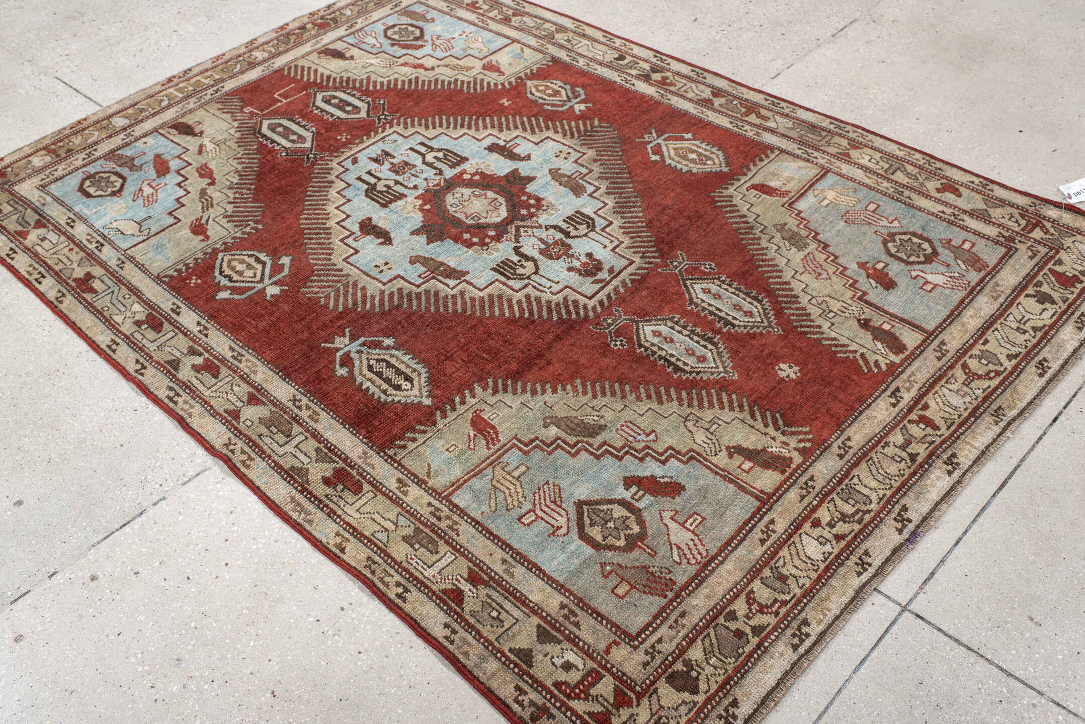 4' x 6' one-of-a-kind handmade vintage Kazak small size rug. Color palette: rust, ivory, sky blue, taupe, brown, charcoal