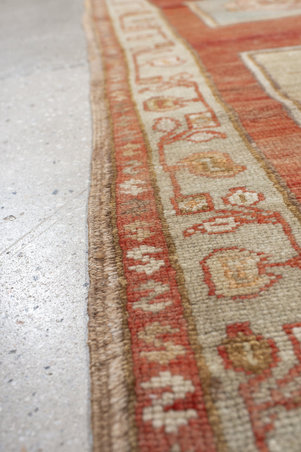 4' x 7' one-of-a-kind handmade vintage Anatolian rug. Color palette: ivory, terra cotta, rust, taupe, sage, camel, rose