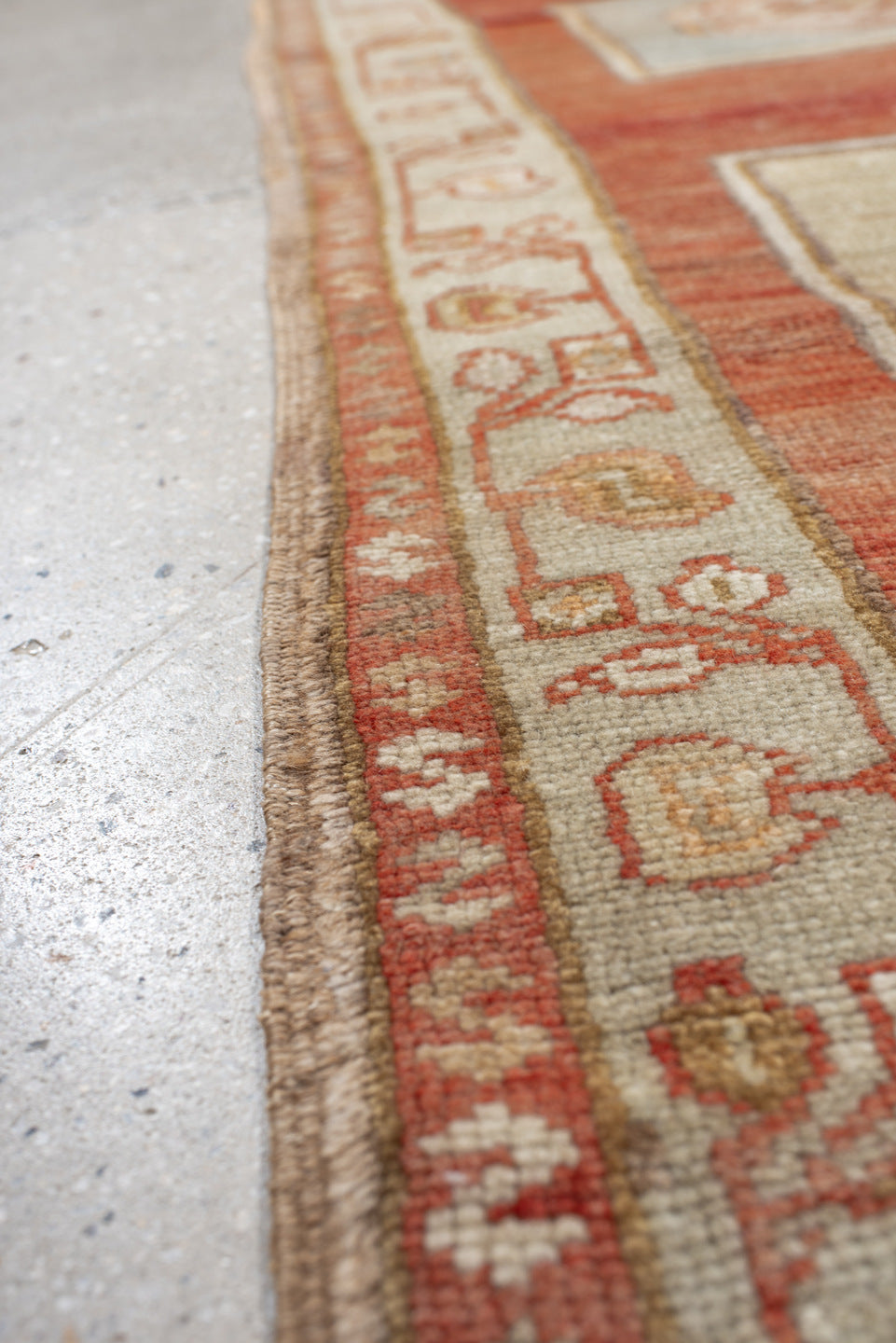 4' x 7' one-of-a-kind handmade vintage Anatolian rug. Color palette: ivory, terra cotta, rust, taupe, sage, camel, rose