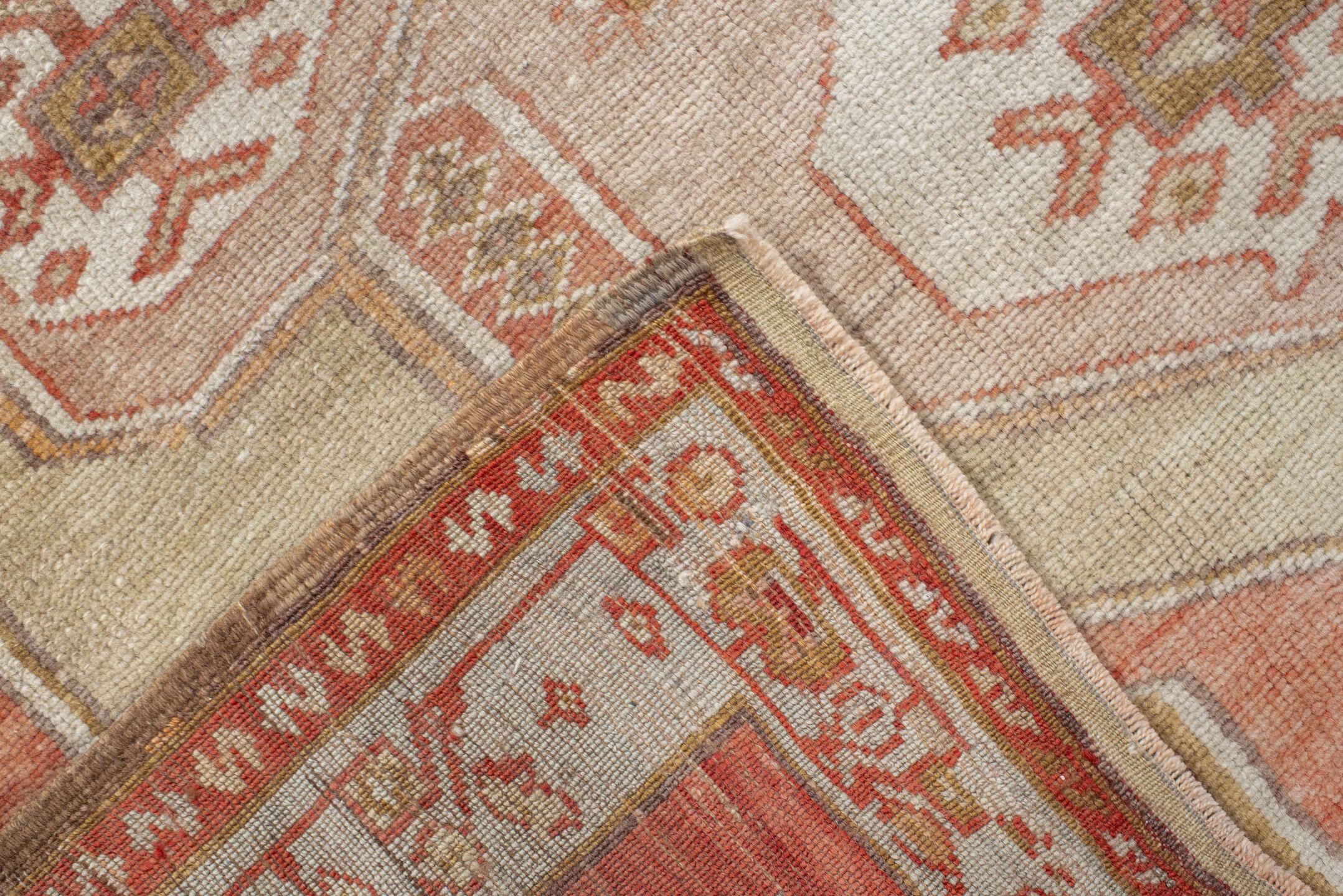 4' x 7' one-of-a-kind handmade vintage Anatolian rug. Color palette: ivory, terra cotta, rust, taupe, sage, camel, rose