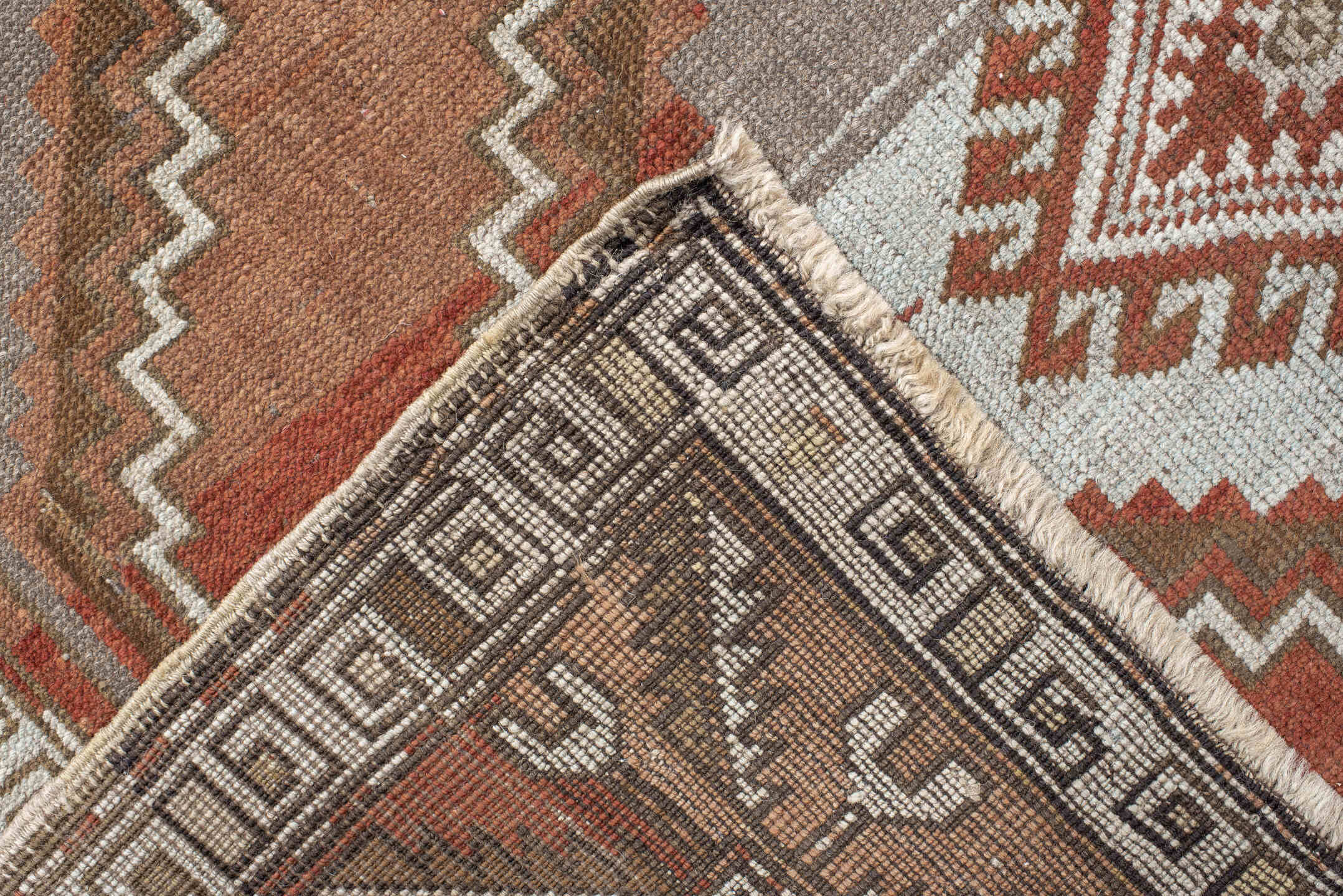 4' x 5' one-of-a-kind handmade vintage Caucasian small size rug. Color palette: brown, floral white, gray, light gray, linen