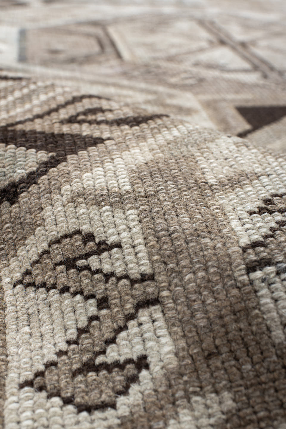 4' x 10' one-of-a-kind handmade antique Caucasian runner rug. Color palette: ivory, charcoal, taupe, brown, slate, gray
