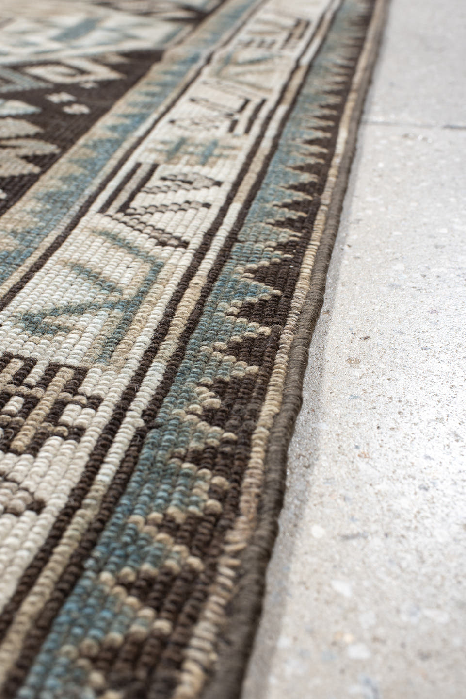 4' x 10' one-of-a-kind handmade antique Caucasian runner rug. Color palette: ivory, charcoal, taupe, brown, slate, gray