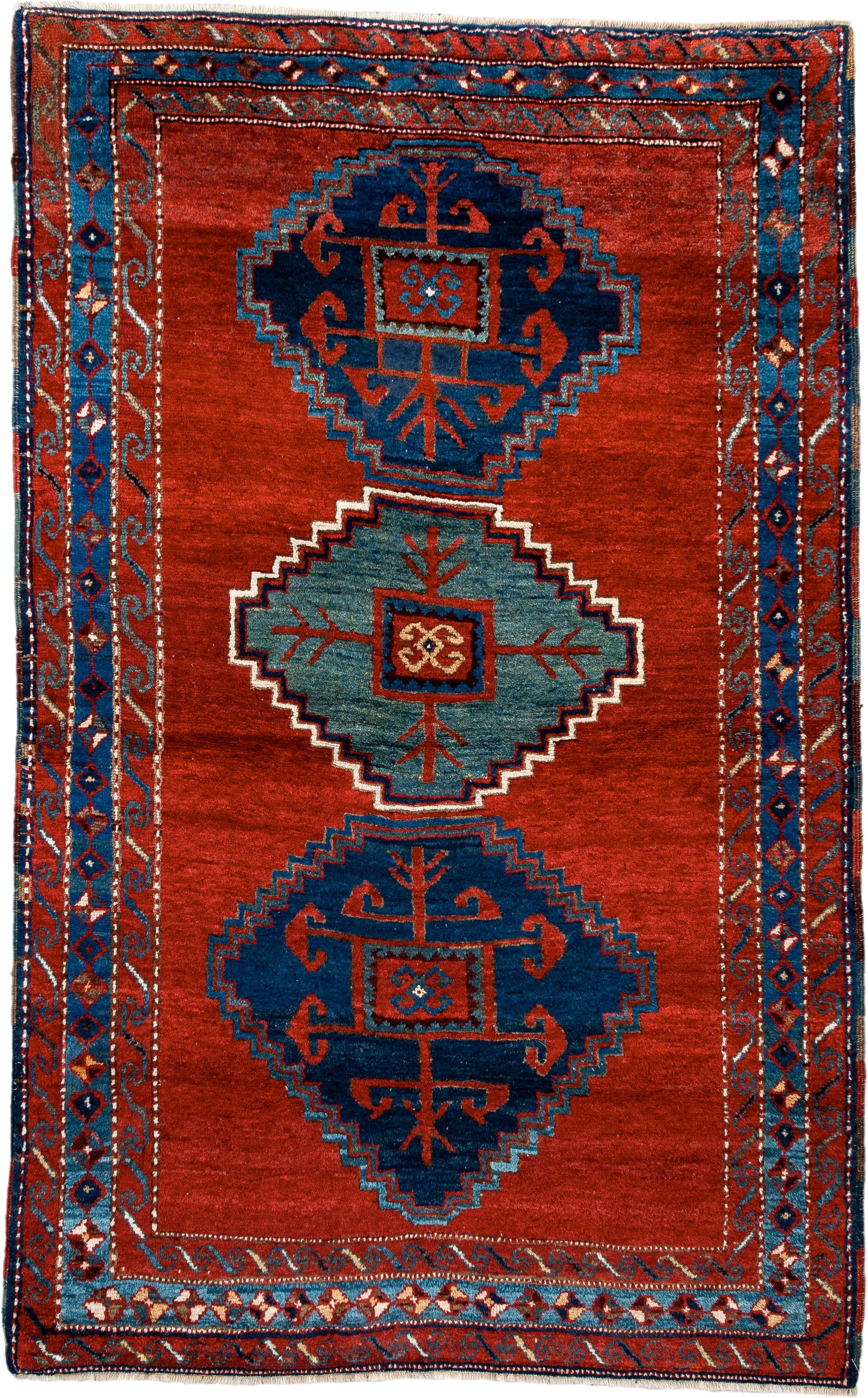 4' x 6' one-of-a-kind handmade antique Kazak small size rug. Color palette: rust, navy, sky_blue, ivory, brick, teal