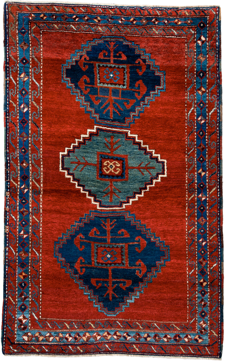 4' x 6' one-of-a-kind handmade antique Kazak small size rug. Color palette: rust, navy, sky_blue, ivory, brick, teal