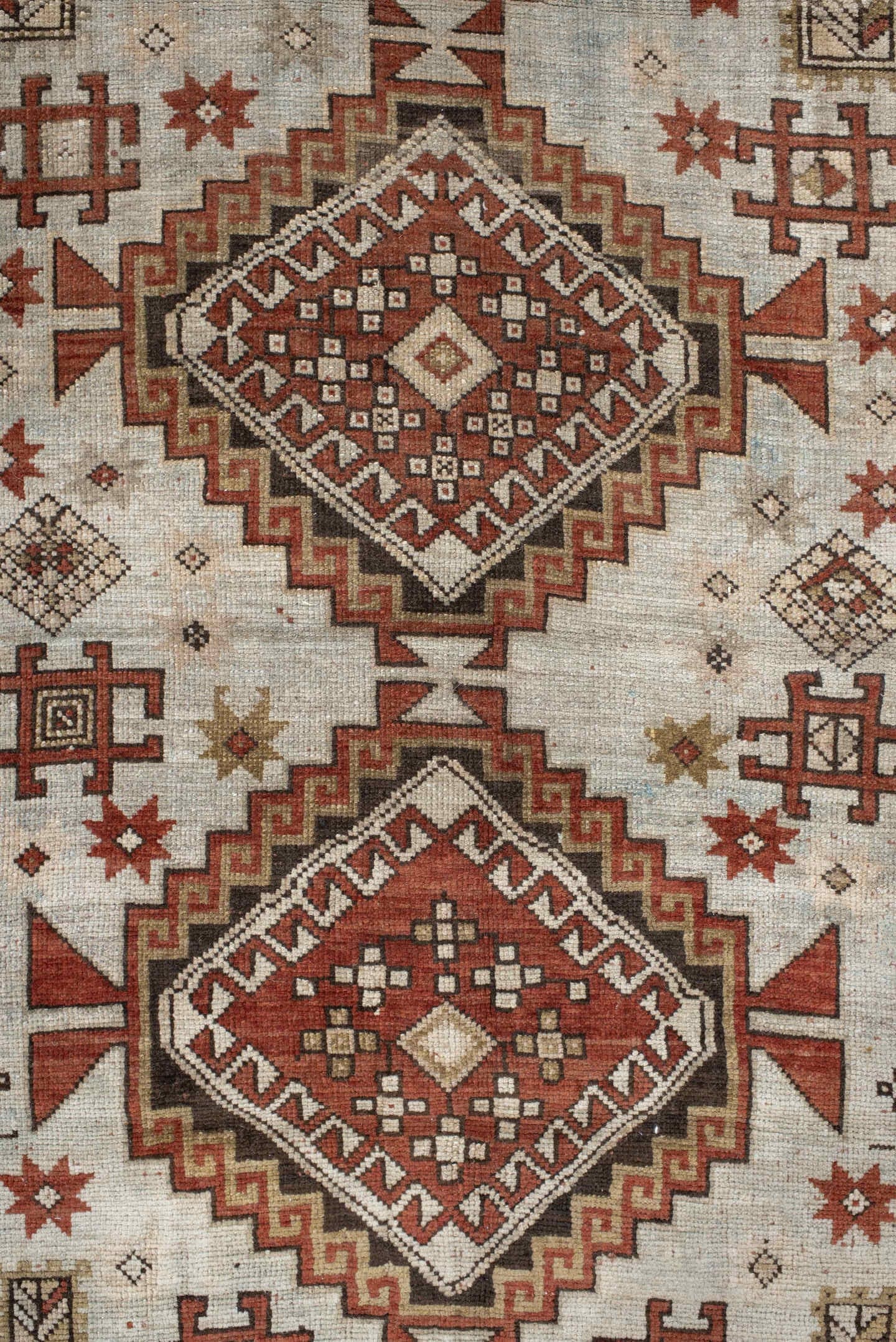 4' x 8' one-of-a-kind handmade vintage Caucasian medium size rug. Color palette: ivory, rust, taupe, brown, charcoal, beige