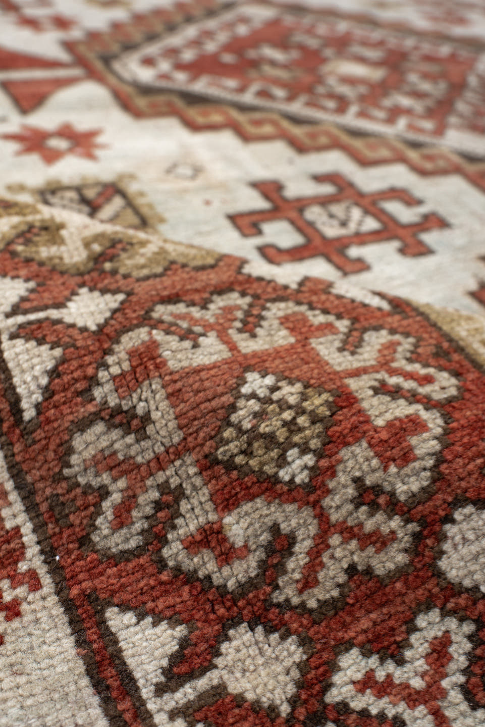 4' x 8' one-of-a-kind handmade vintage Caucasian medium size rug. Color palette: ivory, rust, taupe, brown, charcoal, beige
