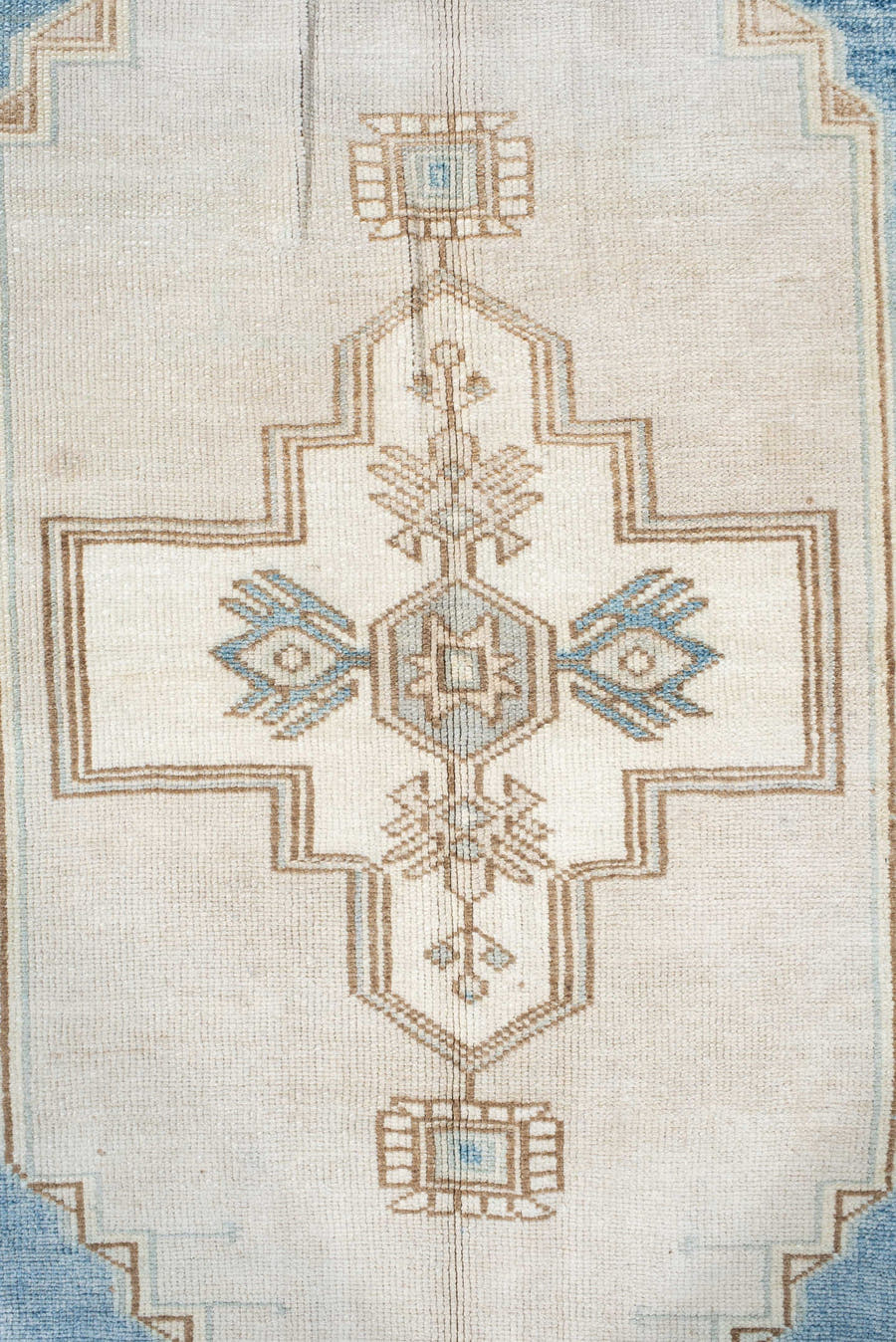4' x 7' one-of-a-kind handmade vintage Anatolian rug. Color palette: ivory, sky blue, beige, taupe, camel, light blue, gray