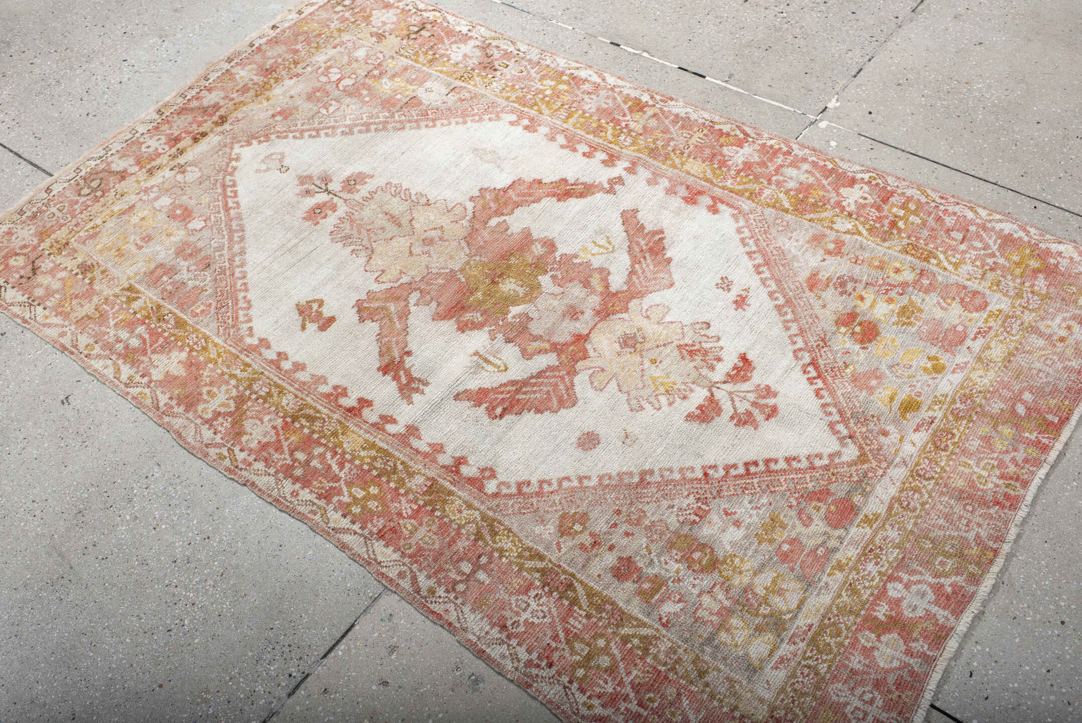 3' x 5' one-of-a-kind handmade antique Oushak small size rug. Color palette: ivory, coral, terracotta, gold, camel, rose