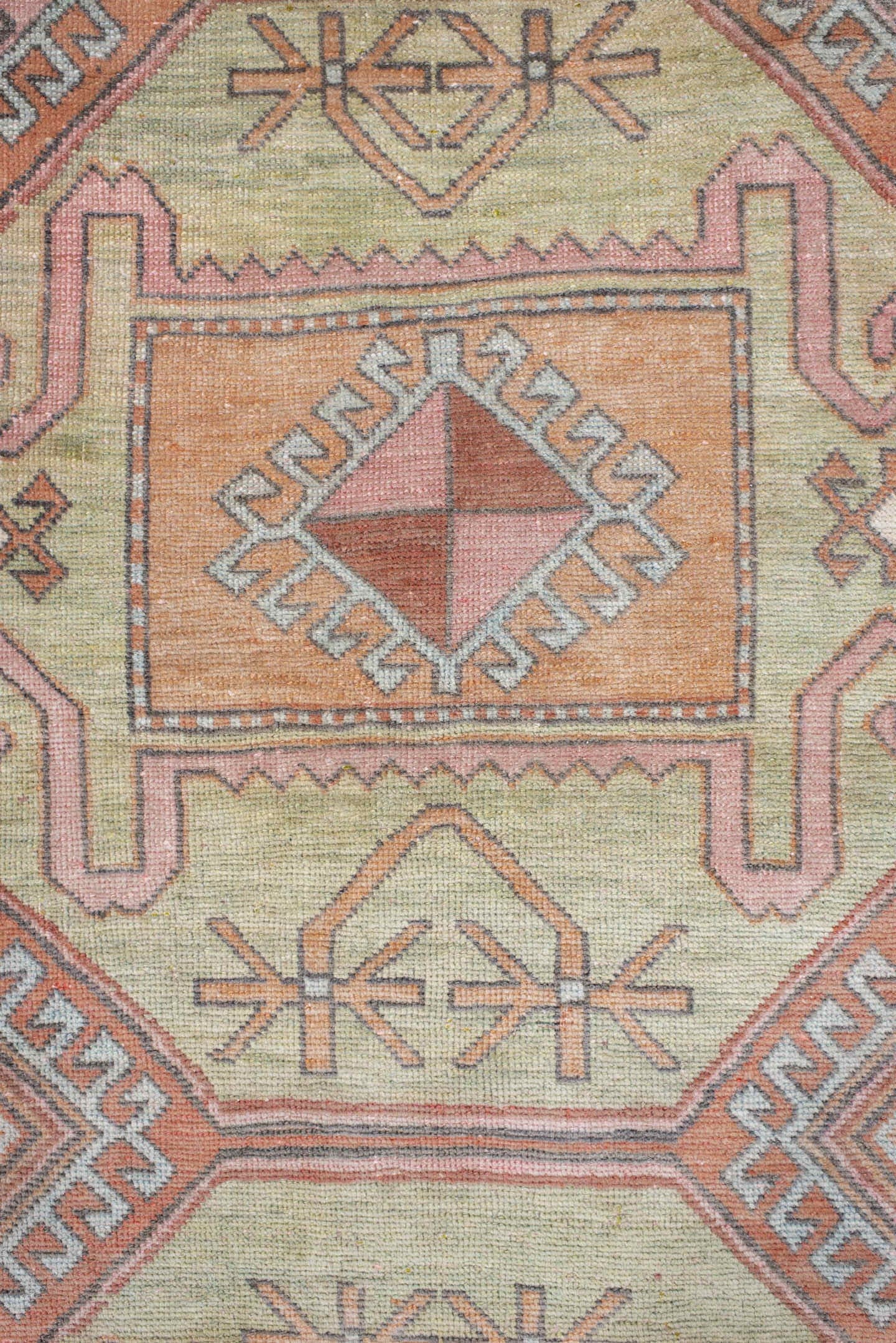 3' x 7' one-of-a-kind handmade antique Trans Caucasian runner rug. Color palette: salmon, sage, ivory, brown, taupe
