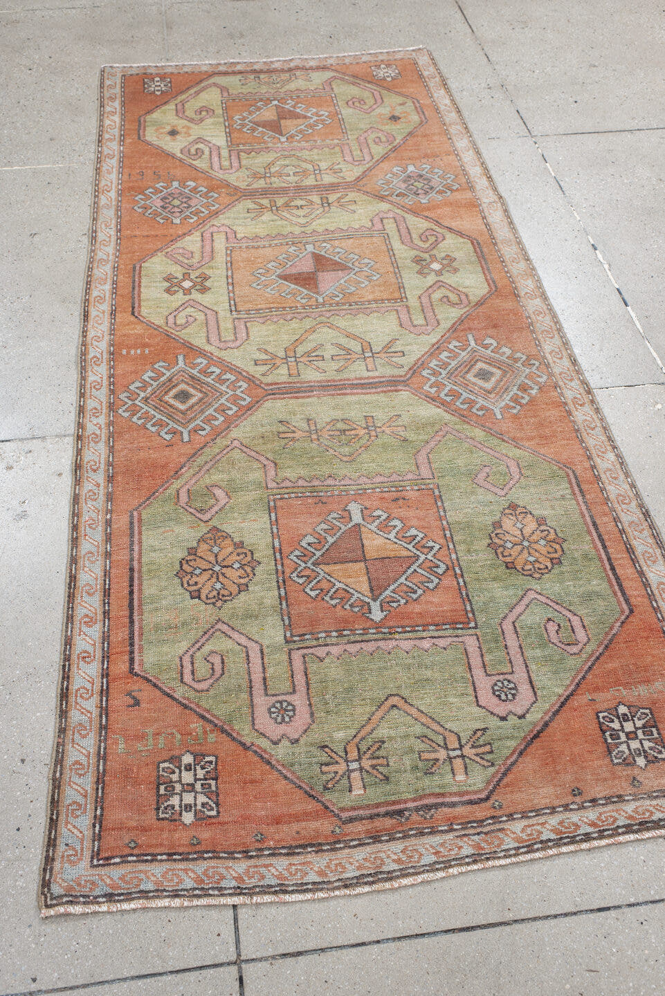 3' x 7' one-of-a-kind handmade antique Trans Caucasian runner rug. Color palette: salmon, sage, ivory, brown, taupe