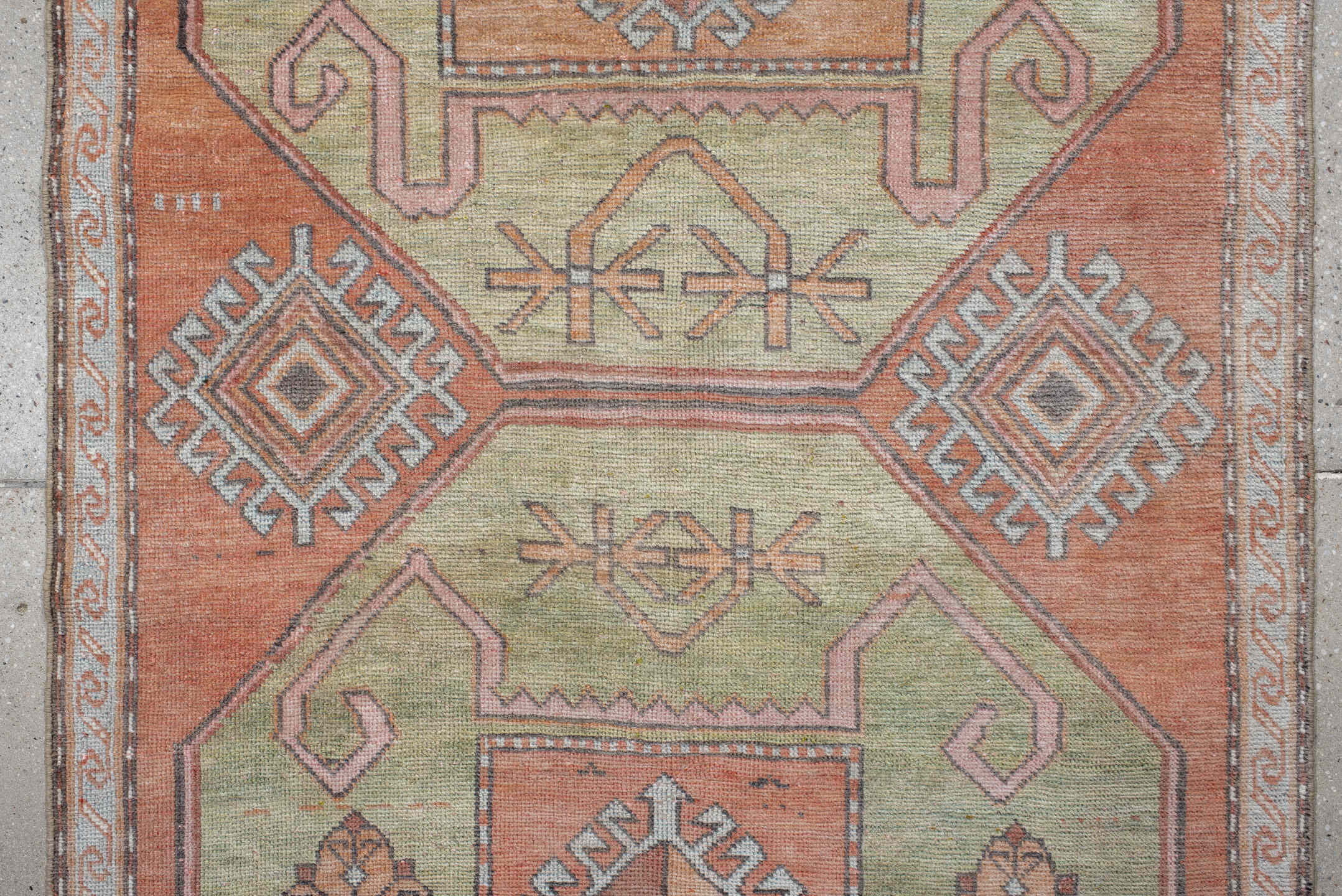 3' x 7' one-of-a-kind handmade antique Trans Caucasian runner rug. Color palette: salmon, sage, ivory, brown, taupe