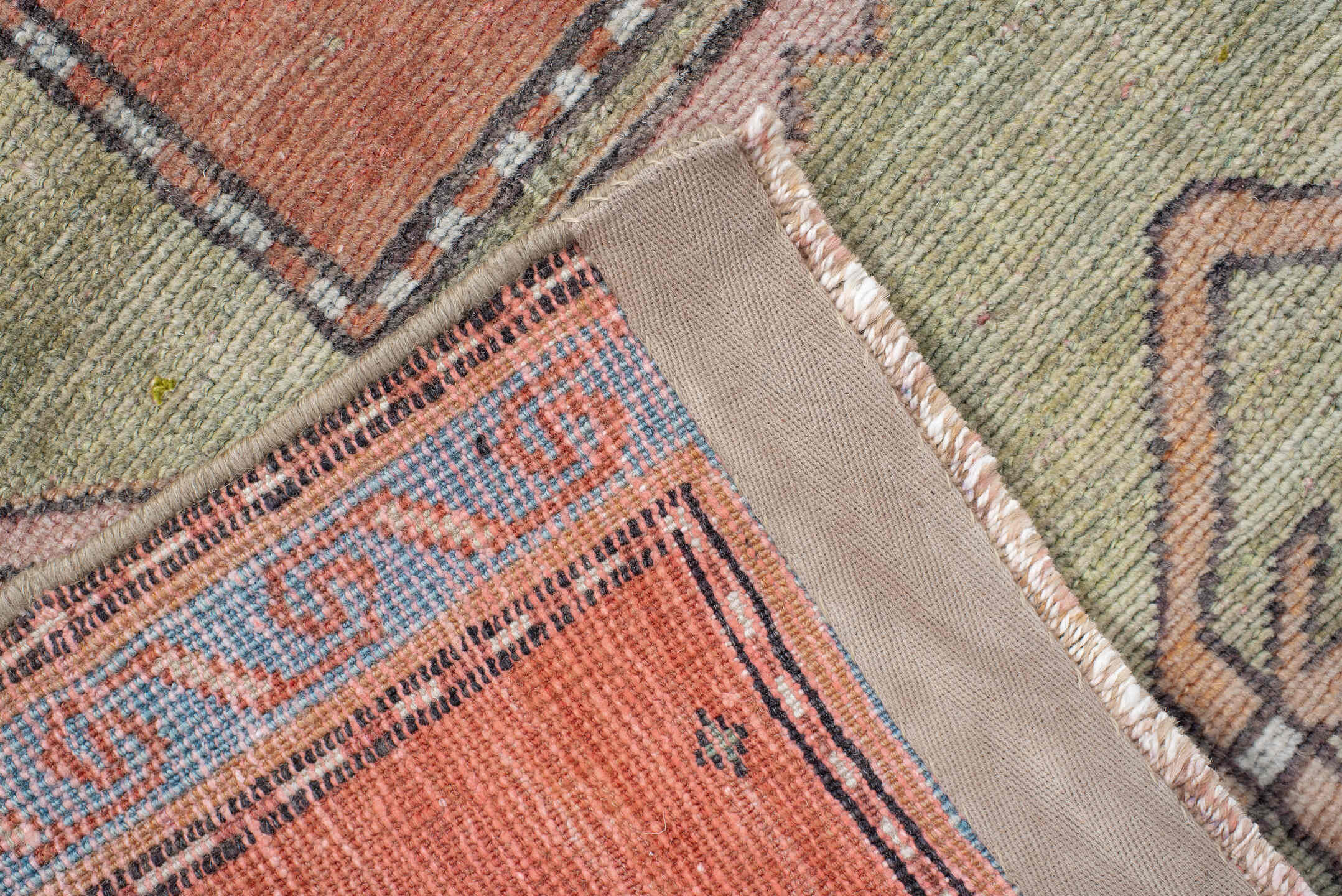 3' x 7' one-of-a-kind handmade antique Trans Caucasian runner rug. Color palette: salmon, sage, ivory, brown, taupe