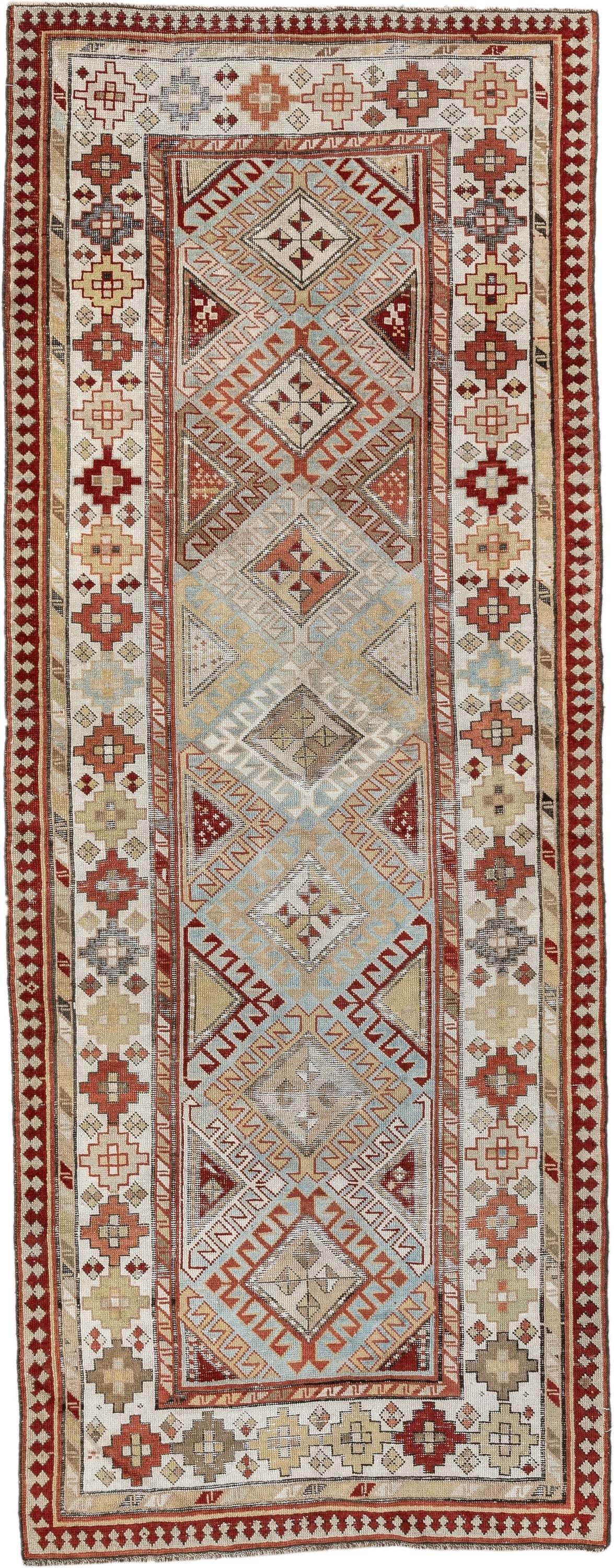 3' x 8' one-of-a-kind handmade antique Caucasian runner rug. Color palette: ivory, sky blue, rust, burgundy, camel, taupe