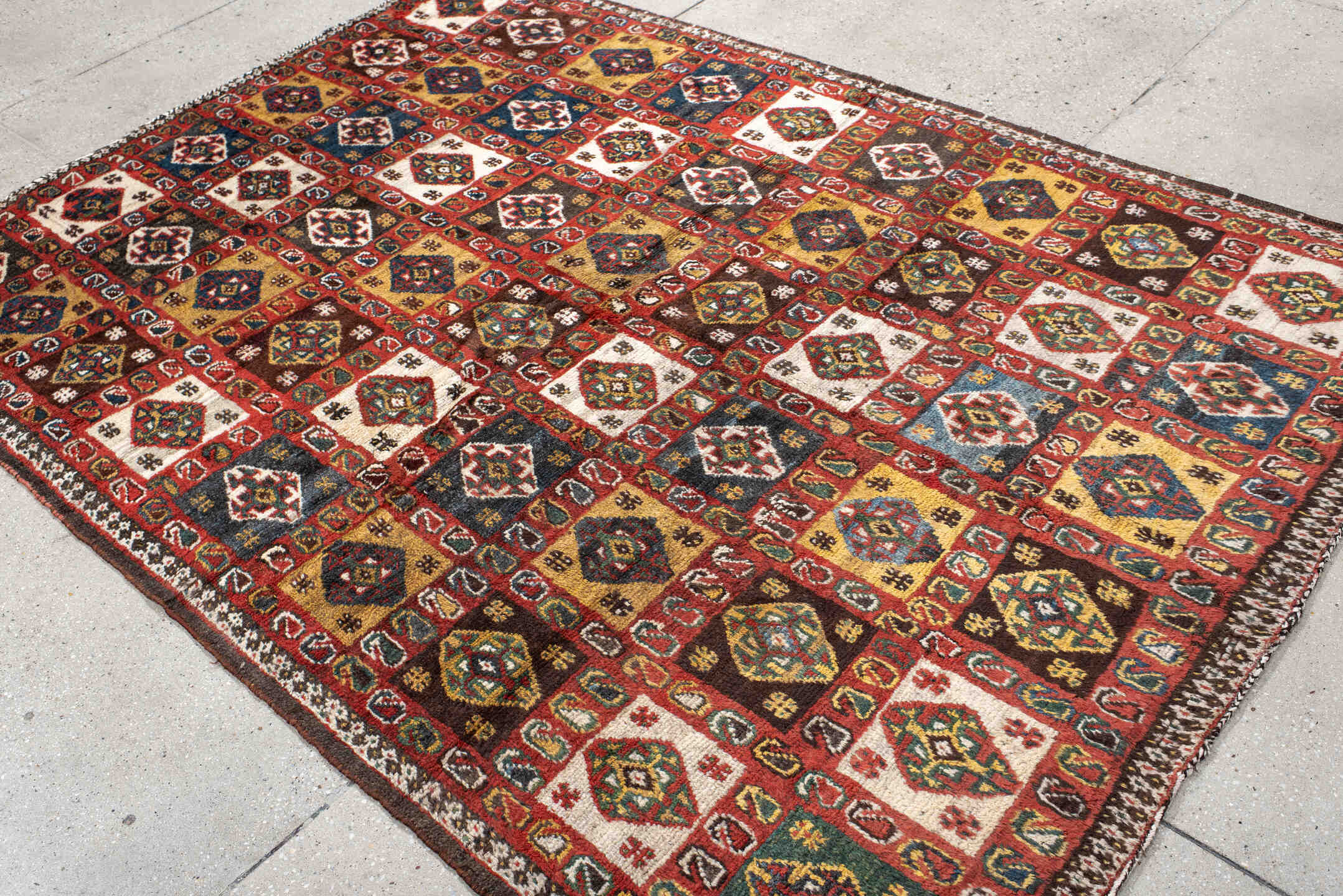 5' x 7' one-of-a-kind handmade vintage Gabbe rug. Color palette: rust, ivory, navy, camel, brown, teal, gold, charcoal