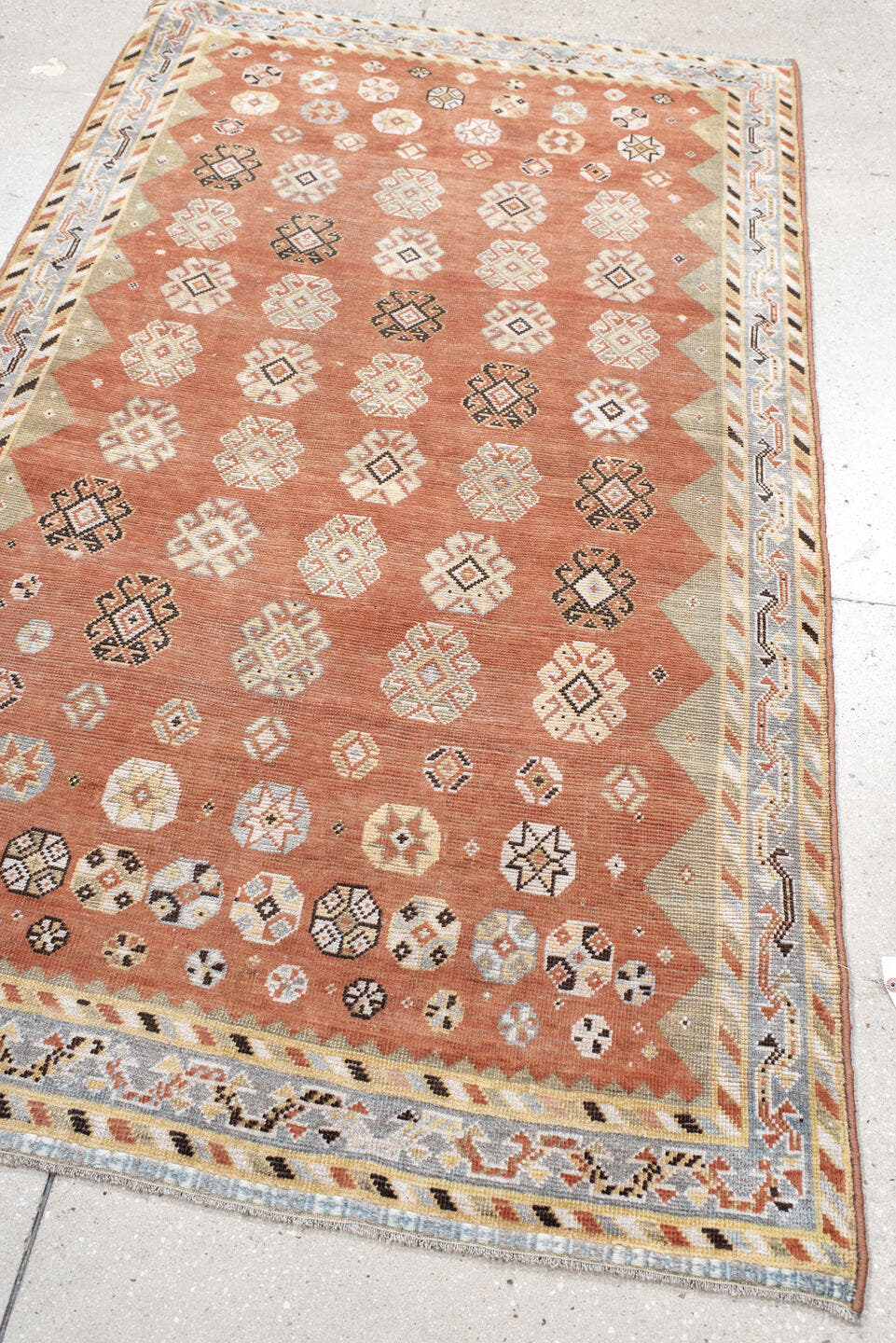 3' x 7' one-of-a-kind handmade vintage Gabbe rug. Color palette: terra cotta, ivory, sage, pale blue, charcoal, taupe, rust
