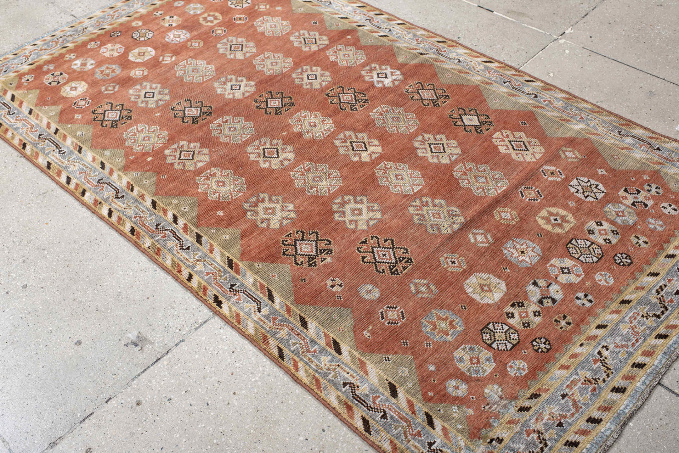 3' x 7' one-of-a-kind handmade vintage Gabbe rug. Color palette: terra cotta, ivory, sage, pale blue, charcoal, taupe, rust
