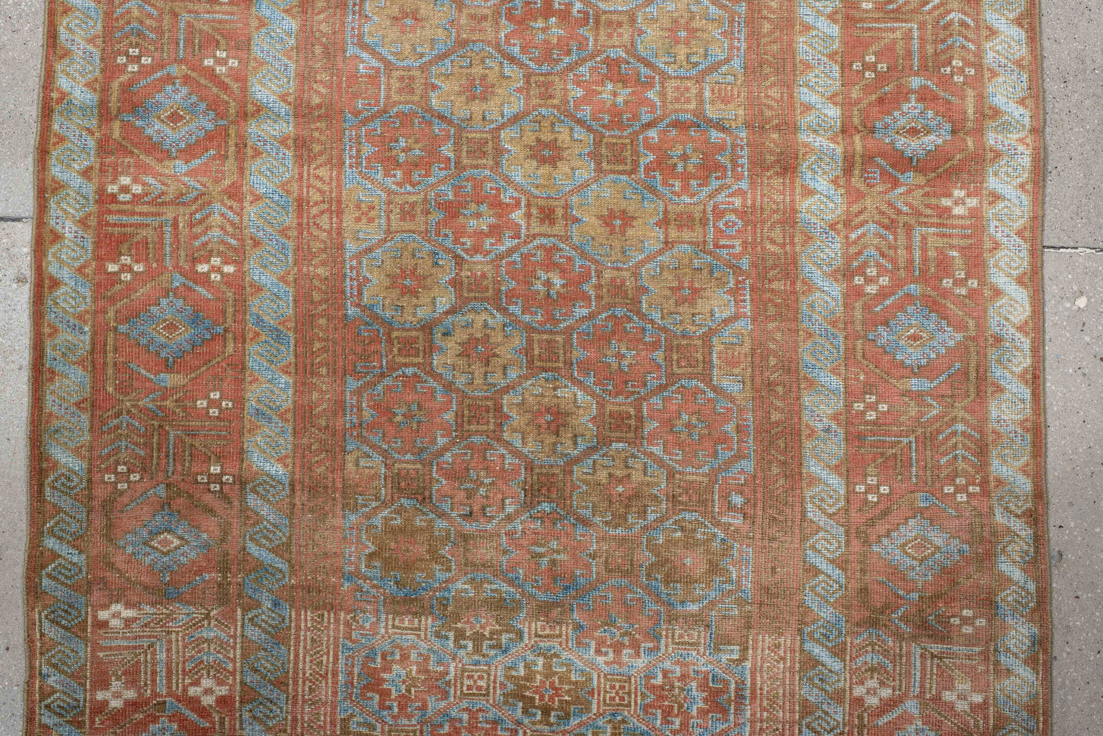 3' x 8' one-of-a-kind handmade antique Belouch runner rug. Color palette: terra cotta, ivory, pale blue, camel, taupe, rust