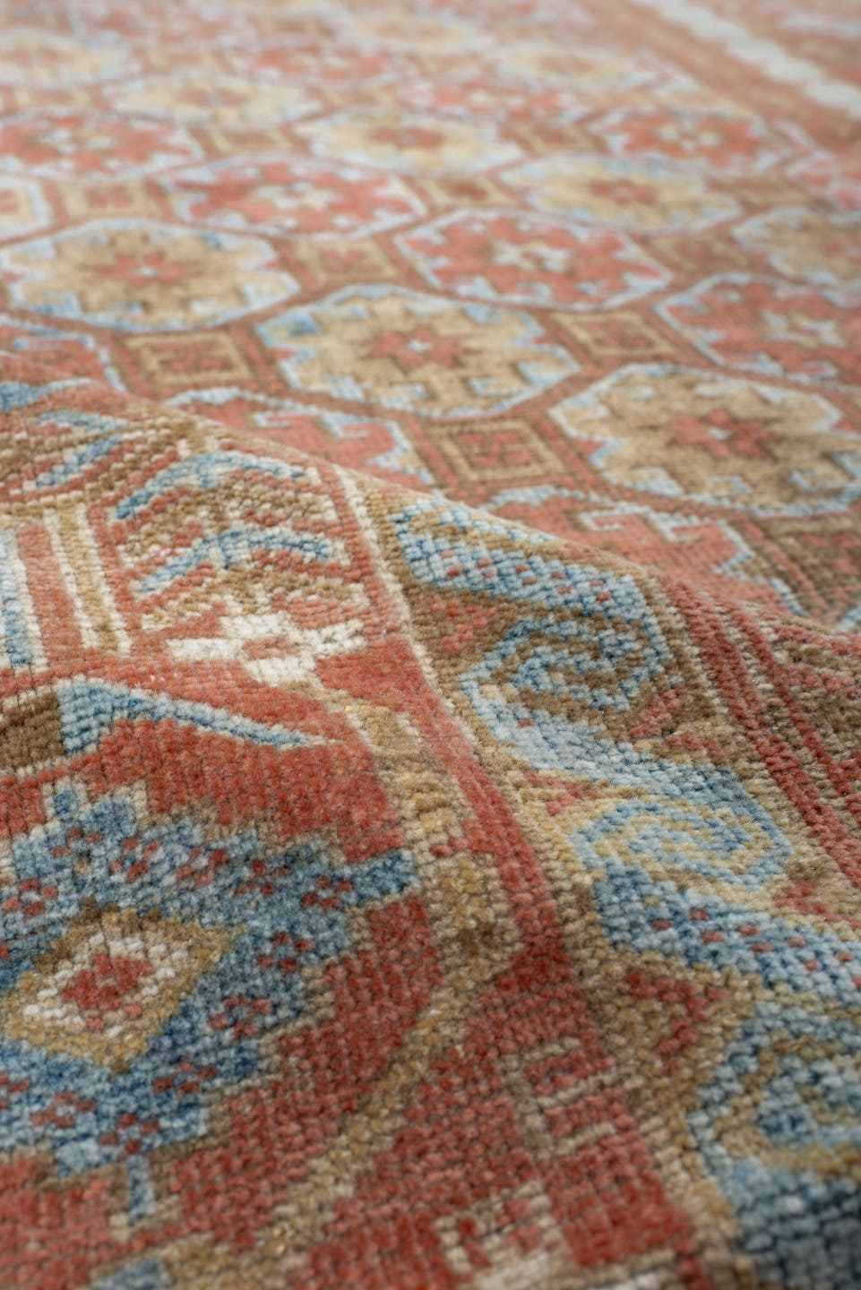 3' x 8' one-of-a-kind handmade antique Belouch runner rug. Color palette: terra cotta, ivory, pale blue, camel, taupe, rust