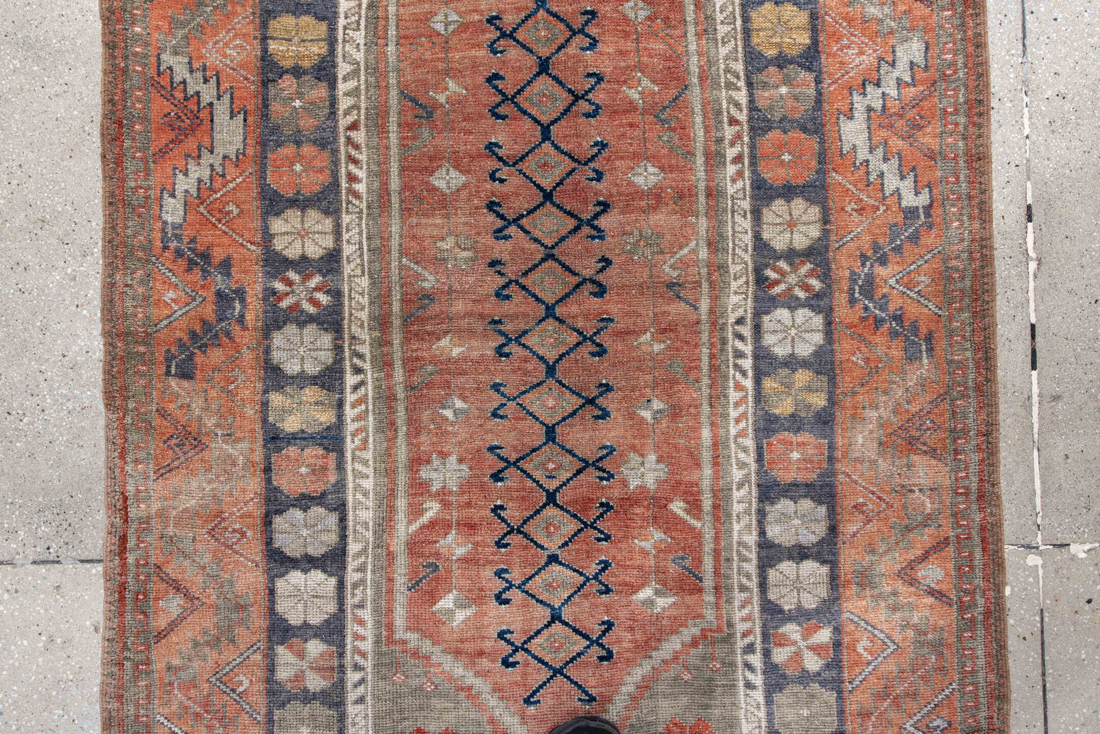 4' x 6' one-of-a-kind handmade antique Anatolian rug. Color palette: coral, gray, navy, ivory, rust, taupe, terracotta, blue
