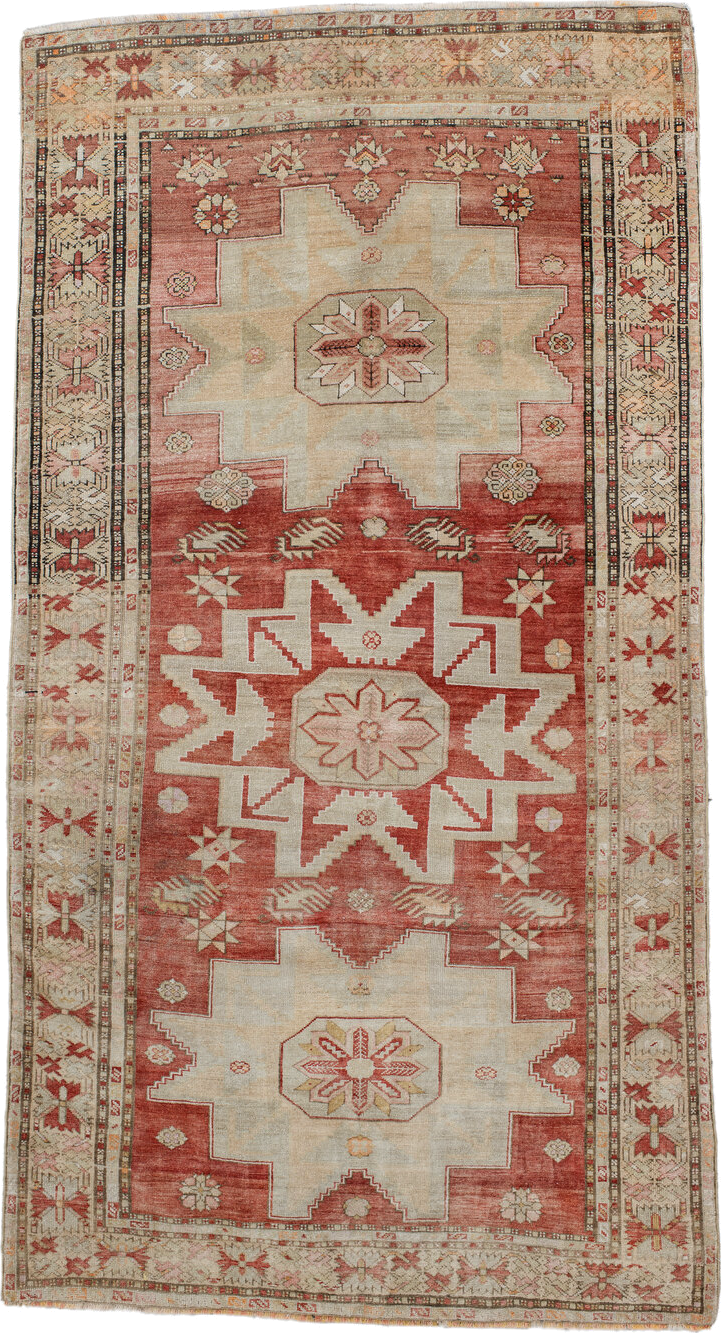 4' x 8' one-of-a-kind handmade antique Anatolian rug. Color palette: rust, ivory, cream, rose, terra cotta, beige, sage