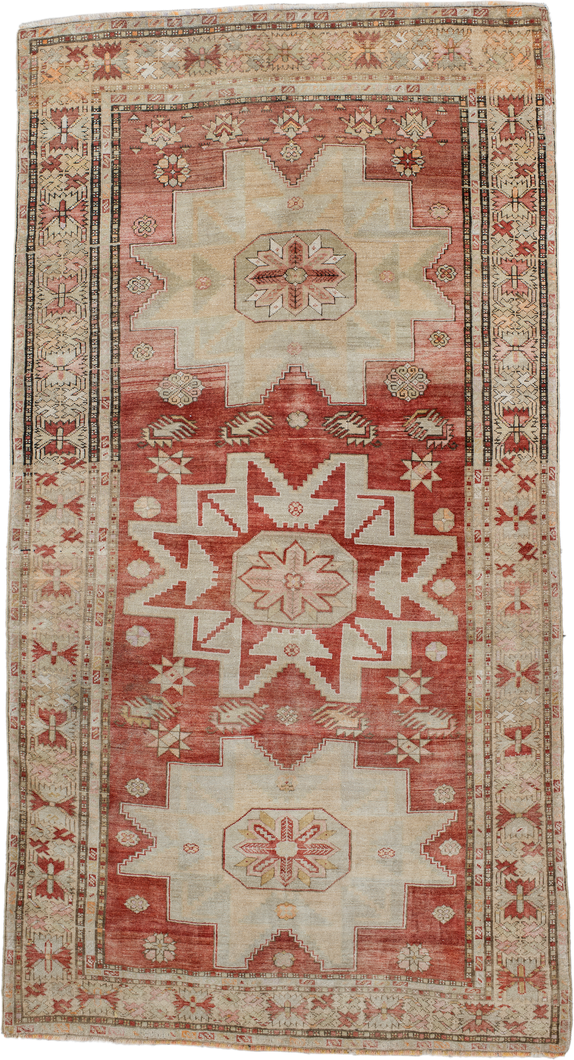 4' x 8' one-of-a-kind handmade antique Anatolian rug. Color palette: rust, ivory, cream, rose, terra cotta, beige, sage