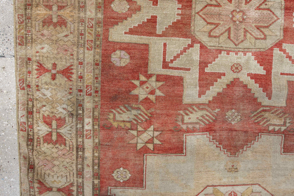 4' x 8' one-of-a-kind handmade antique Anatolian rug. Color palette: rust, ivory, cream, rose, terra cotta, beige, sage