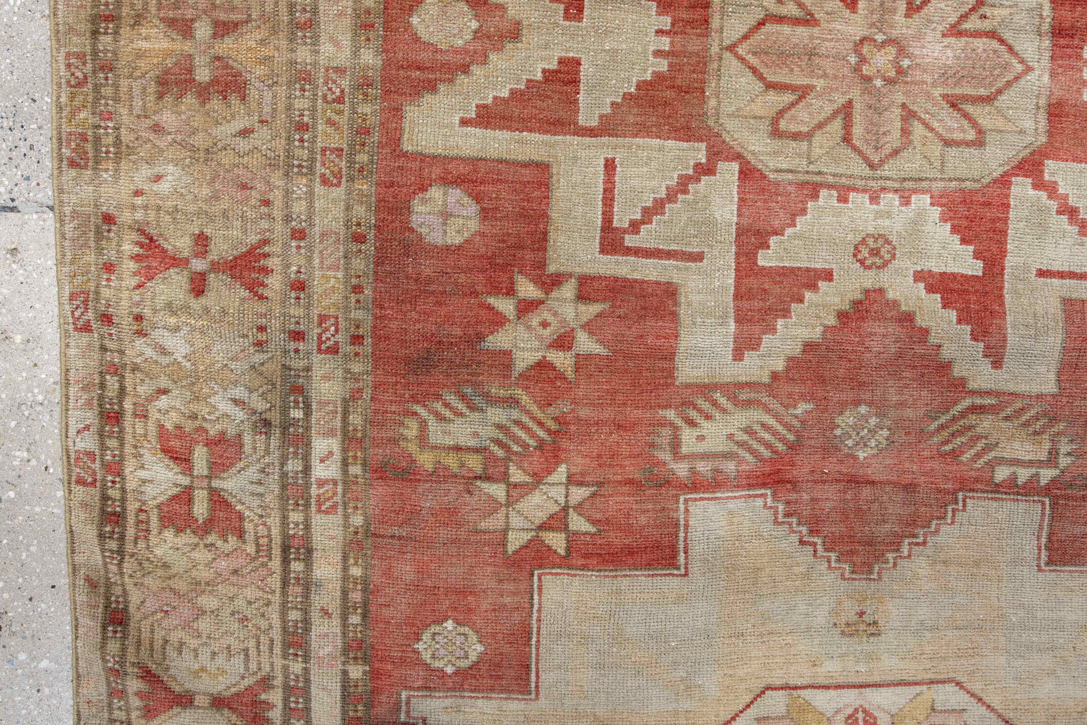 4' x 8' one-of-a-kind handmade vintage Anatol rug. Color palette: brown, gray, light gray, off-white, orange, pink, red