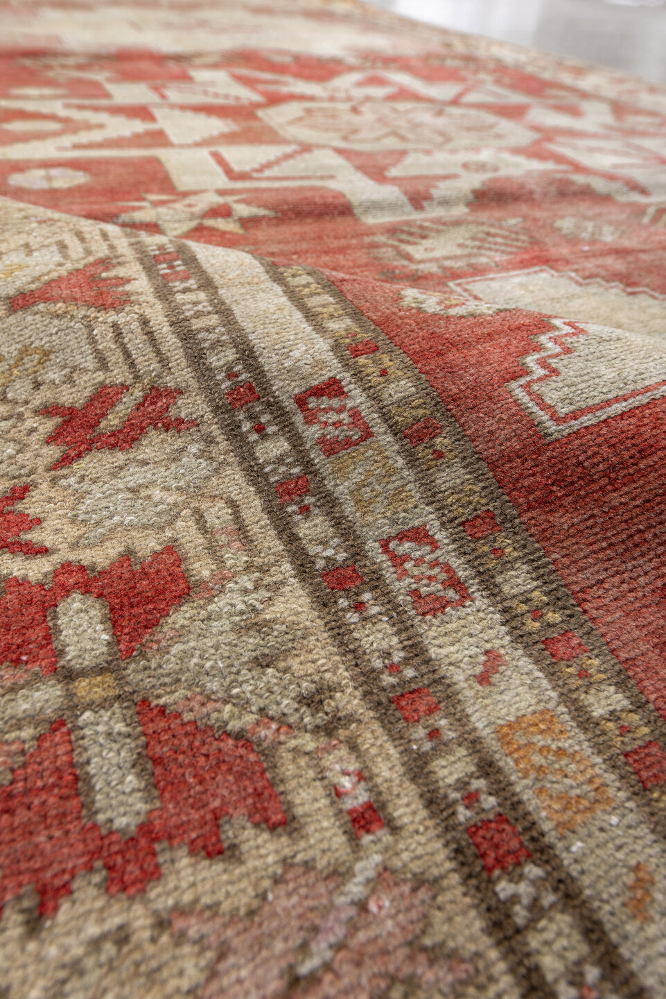 4' x 8' one-of-a-kind handmade vintage Anatol rug. Color palette: brown, gray, light gray, off-white, orange, pink, red