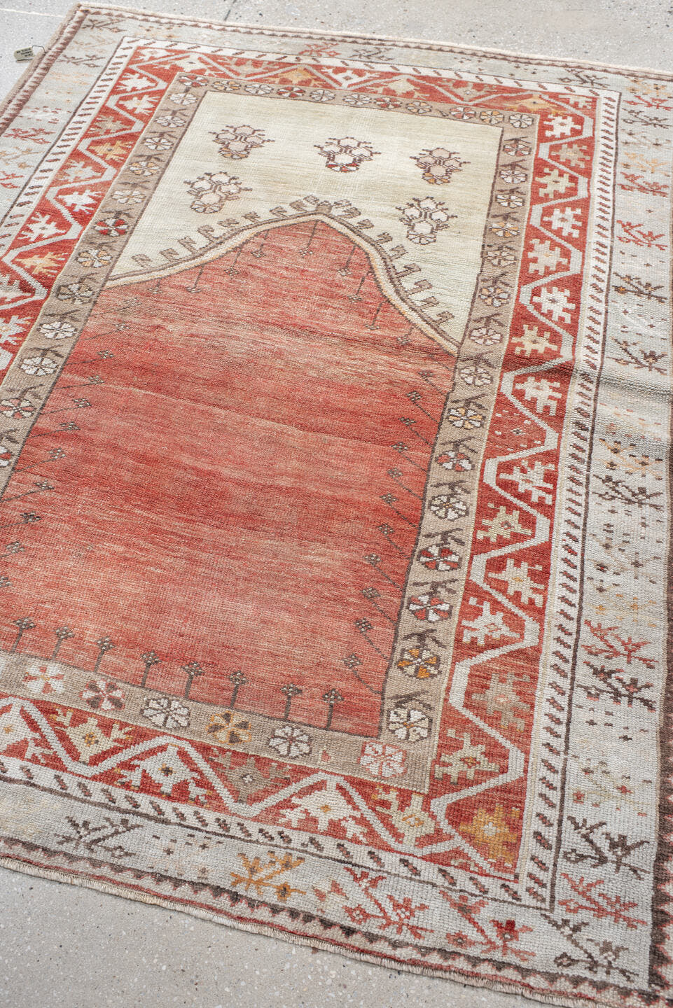 4' x 5' one-of-a-kind handmade antique Anatolian small size rug. Color palette: ivory, terra cotta, rust, taupe, brown