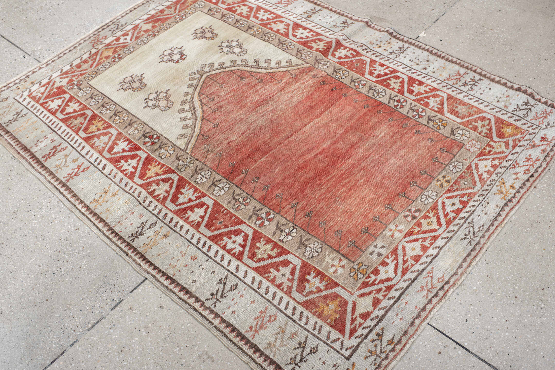 4' x 5' one-of-a-kind handmade antique Anatolian small size rug. Color palette: ivory, terra cotta, rust, taupe, brown